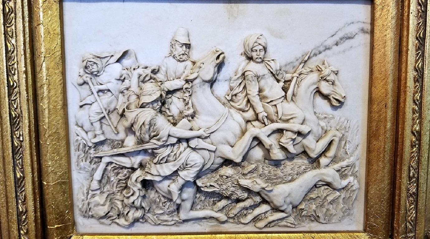 Really nice Indo-Persian framed marble plaque.
We think the frame might be later, but the plaque is definitely 19th century.
Either Indian or Persian, depicting wild boar hunt scene with dogs and Army Officer and Natives on horseback.
From circa