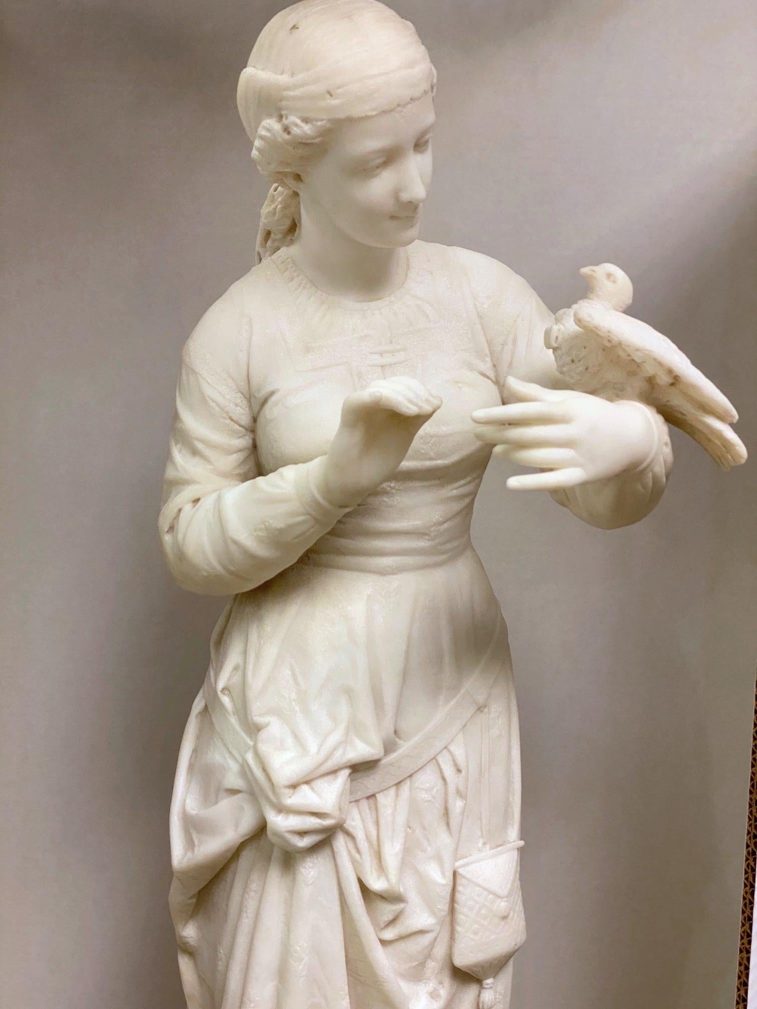 Very finely carved 19th century Italian Renaissance Revival marble statue of a Maiden with a messenger bird on her arms bearing a Love Letter on its neck.
Apparently unsigned but great detailed quality carving and a great subject matter.