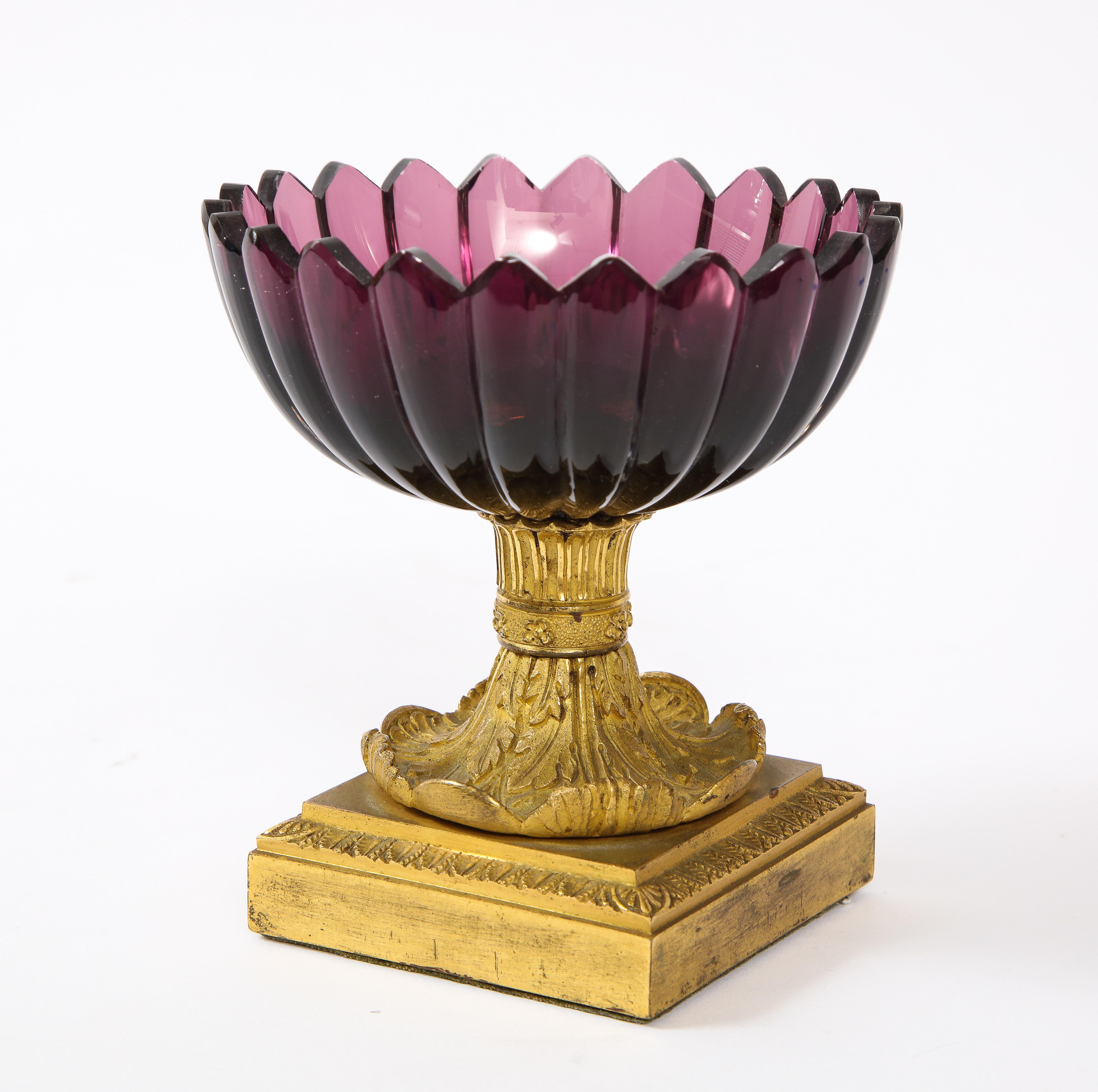 A fantastic quality 19th century Russian Empire period Dore bronze mounted amethyst crystal scalloped rim tazza/cache-pot. The crystal is of a beautiful rich amethyst purple color. The crystal is beautifully hand-cut and shaped with a scalloped rim.