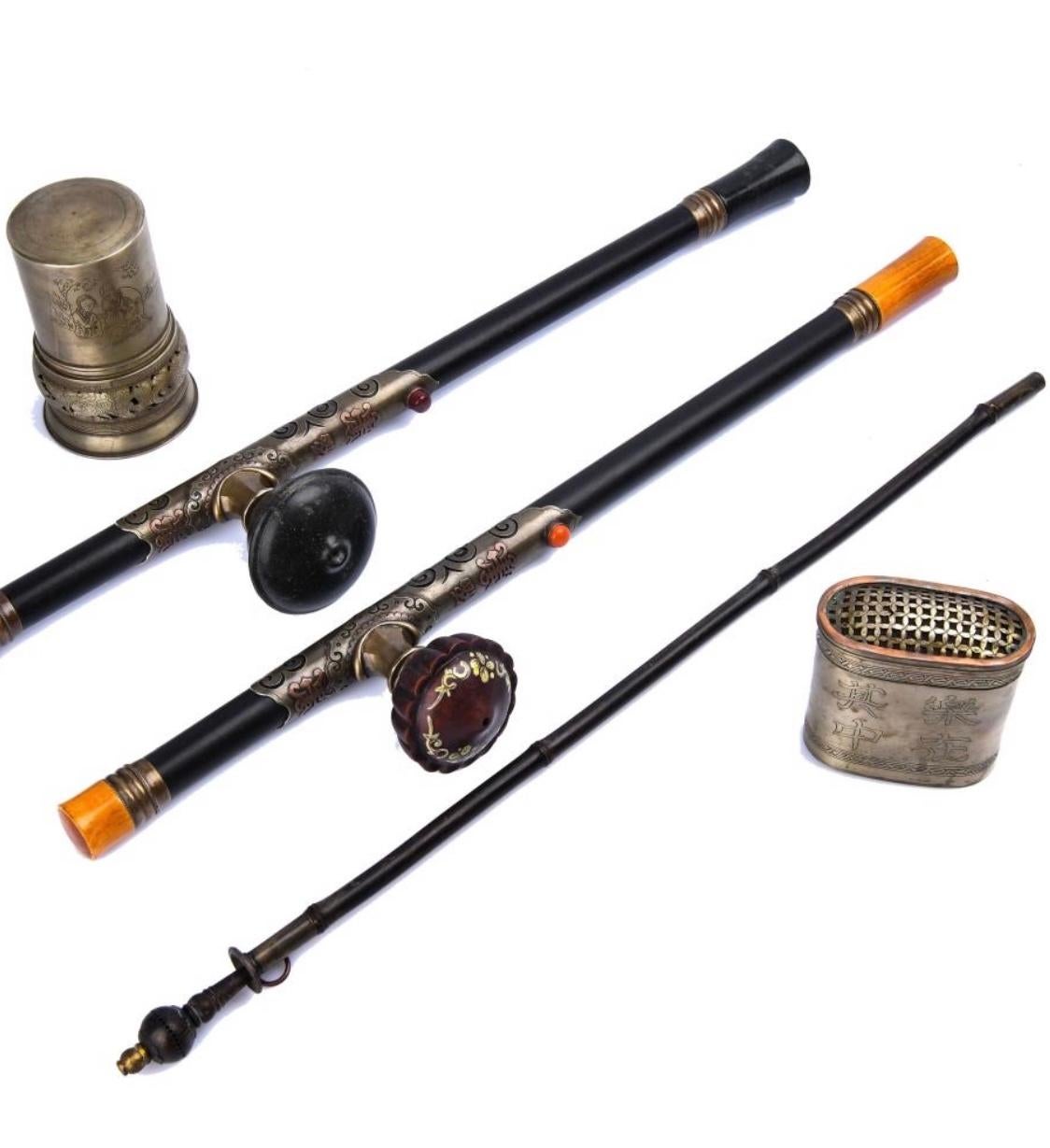 19th century set of five-piece Zitan opium pipes and accessories, two long beautiful Zitan opium pipes, one opium light 3in x 3in x 5in and one opium bo x 3.25in x 3.25in x 1.75in both with Hetai mark.