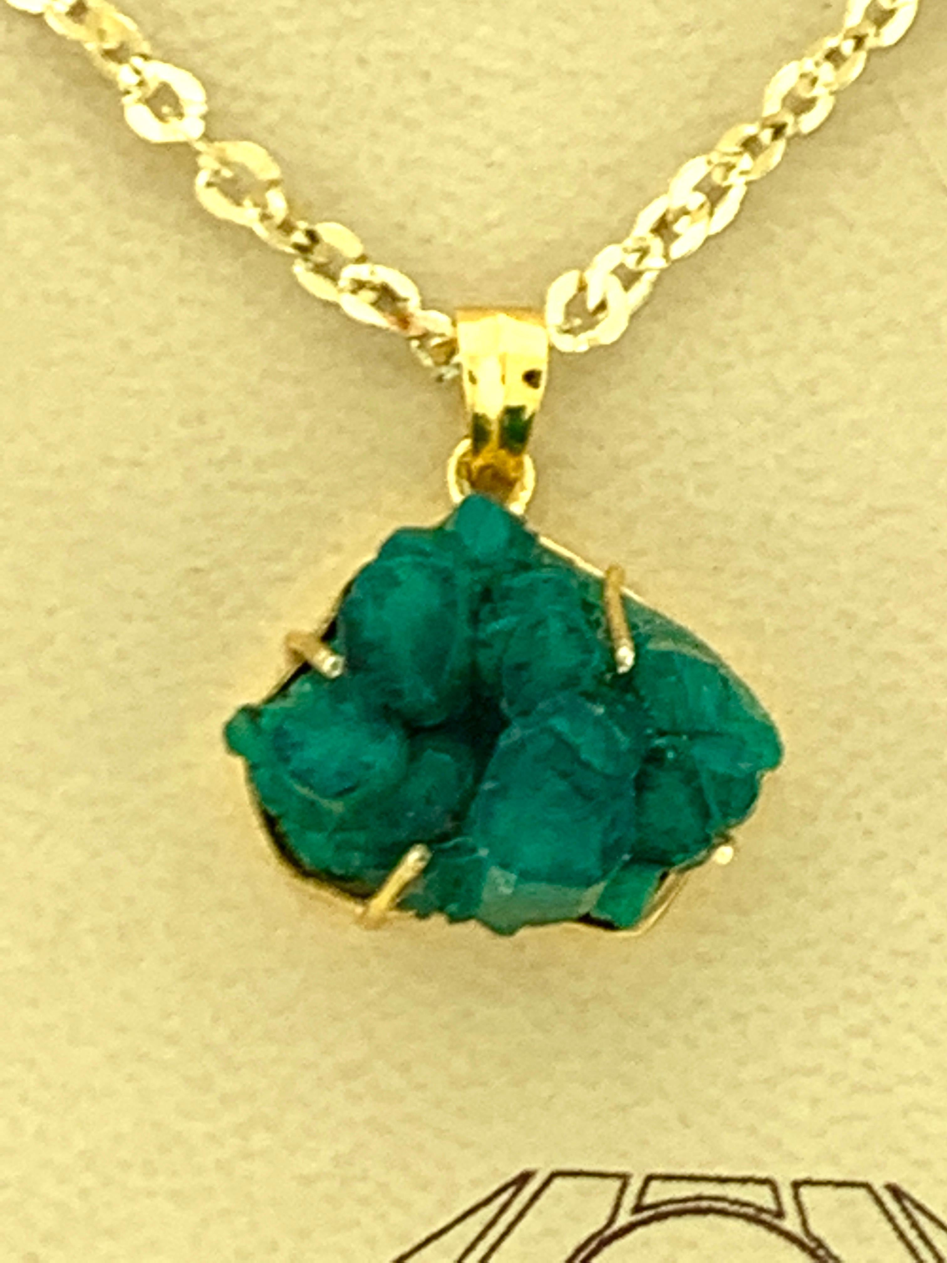 rough emerald pendant