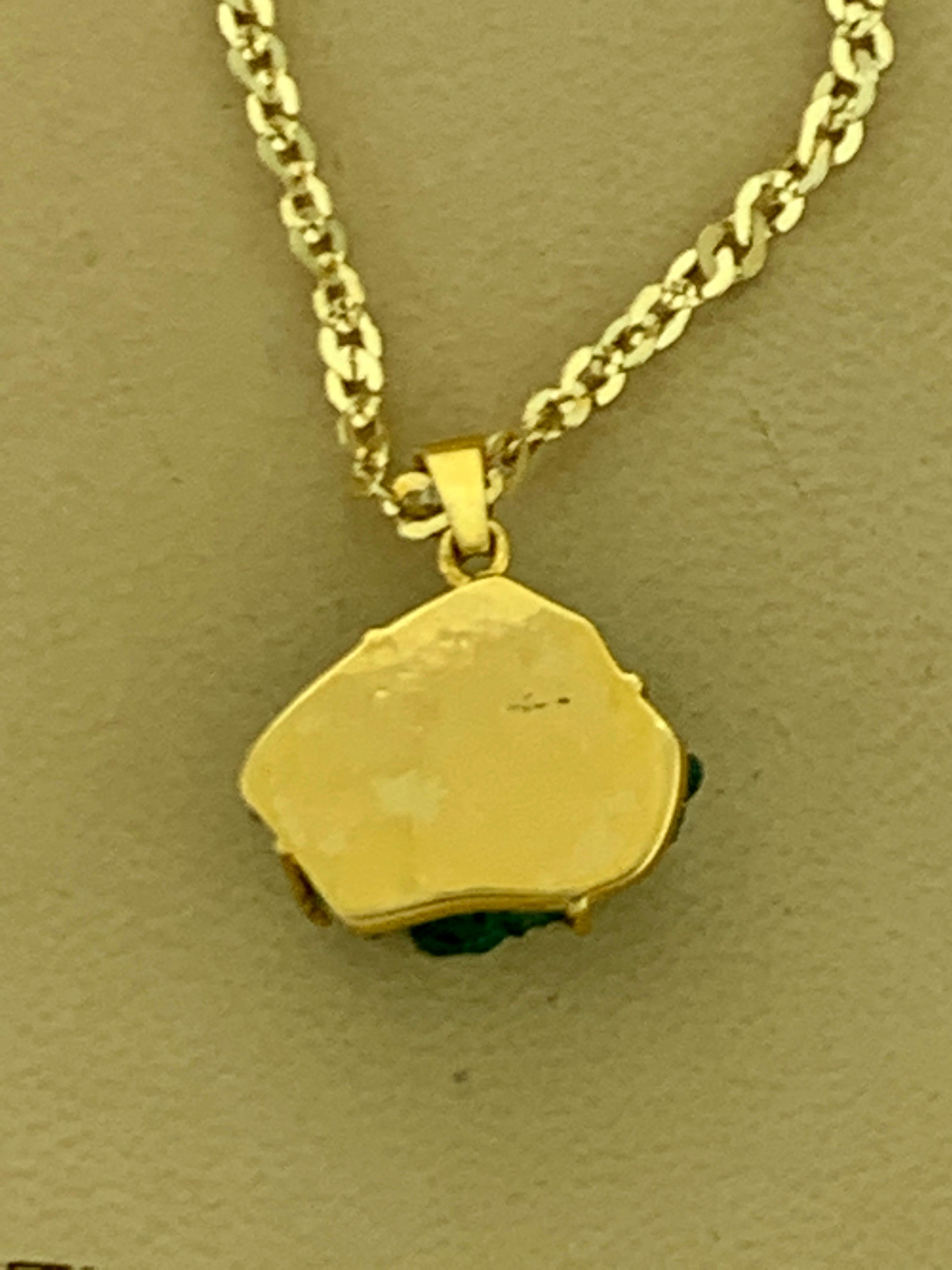 raw emerald pendant