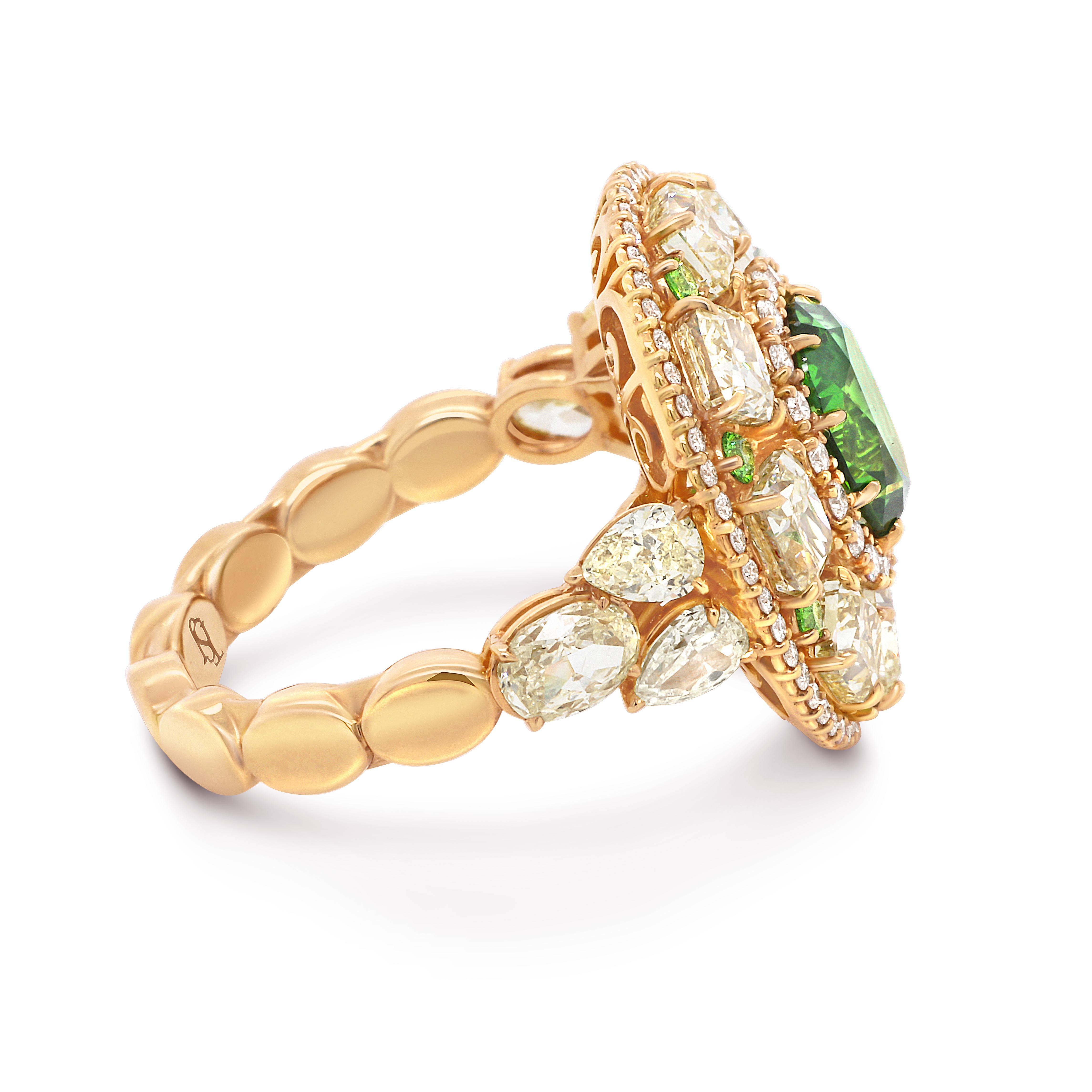 It's an exquisite 18 KT Yellow Gold ring. Center stone is a stunning 1.9 ct GRS certified Russian Demantoid surrounded by Fancy Yellow Diamonds Totaling 4.5 Carats. Total Weight of Colorless Diamonds 0.34 CTW. 
A real masterpiece!

Center stone: