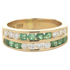 19 Karat Yellow Gold Double Row Channel Set Diamond and Emerald Band