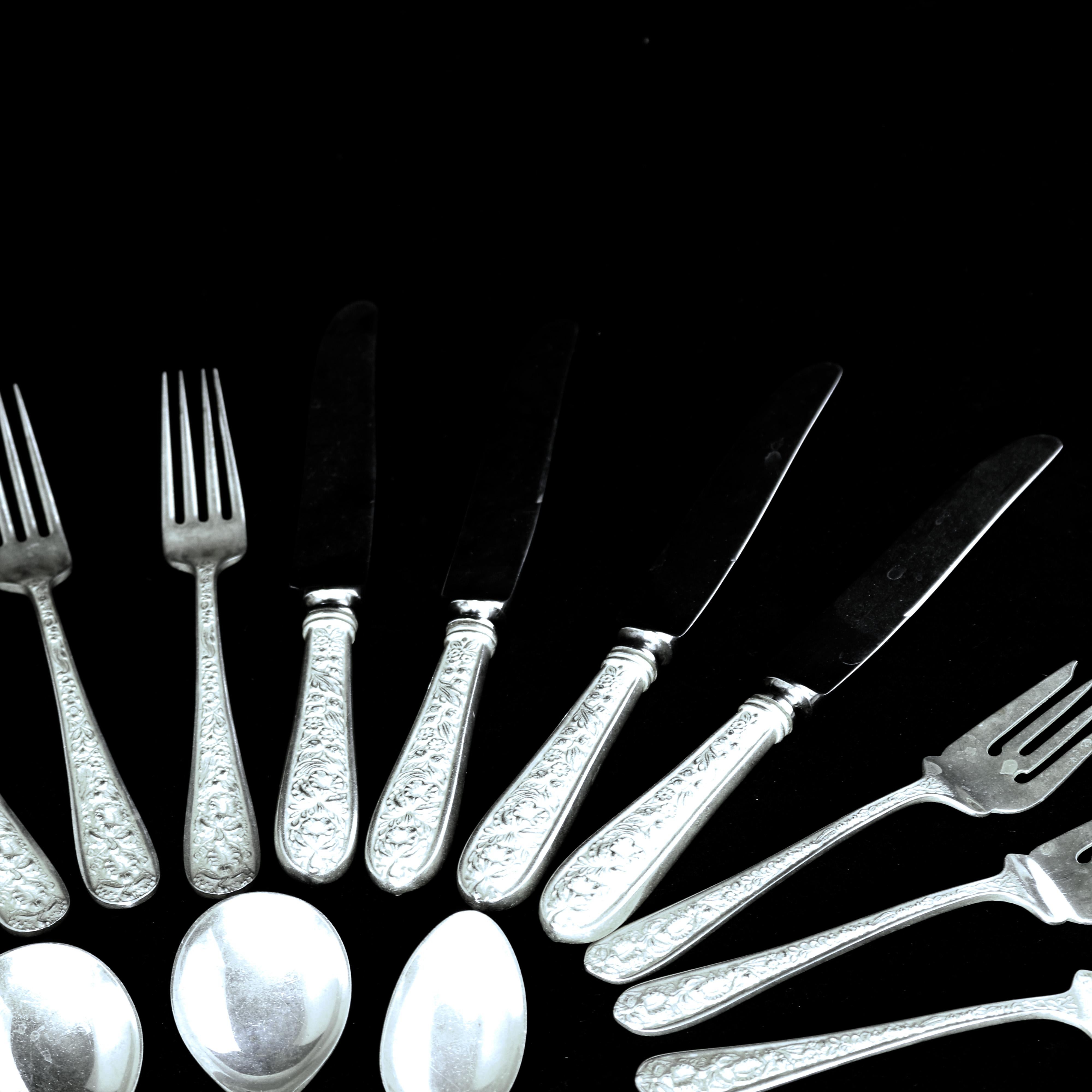 19 piece sterling silver flatware set by S. Kirk & Son Inc features the floral high relief Stieff Rose pattern, en verso stamped, 19th century

Includes:
4 dinner forks
4 dinner knives
6 salad forks
2 butter knives
3 spoons.



   