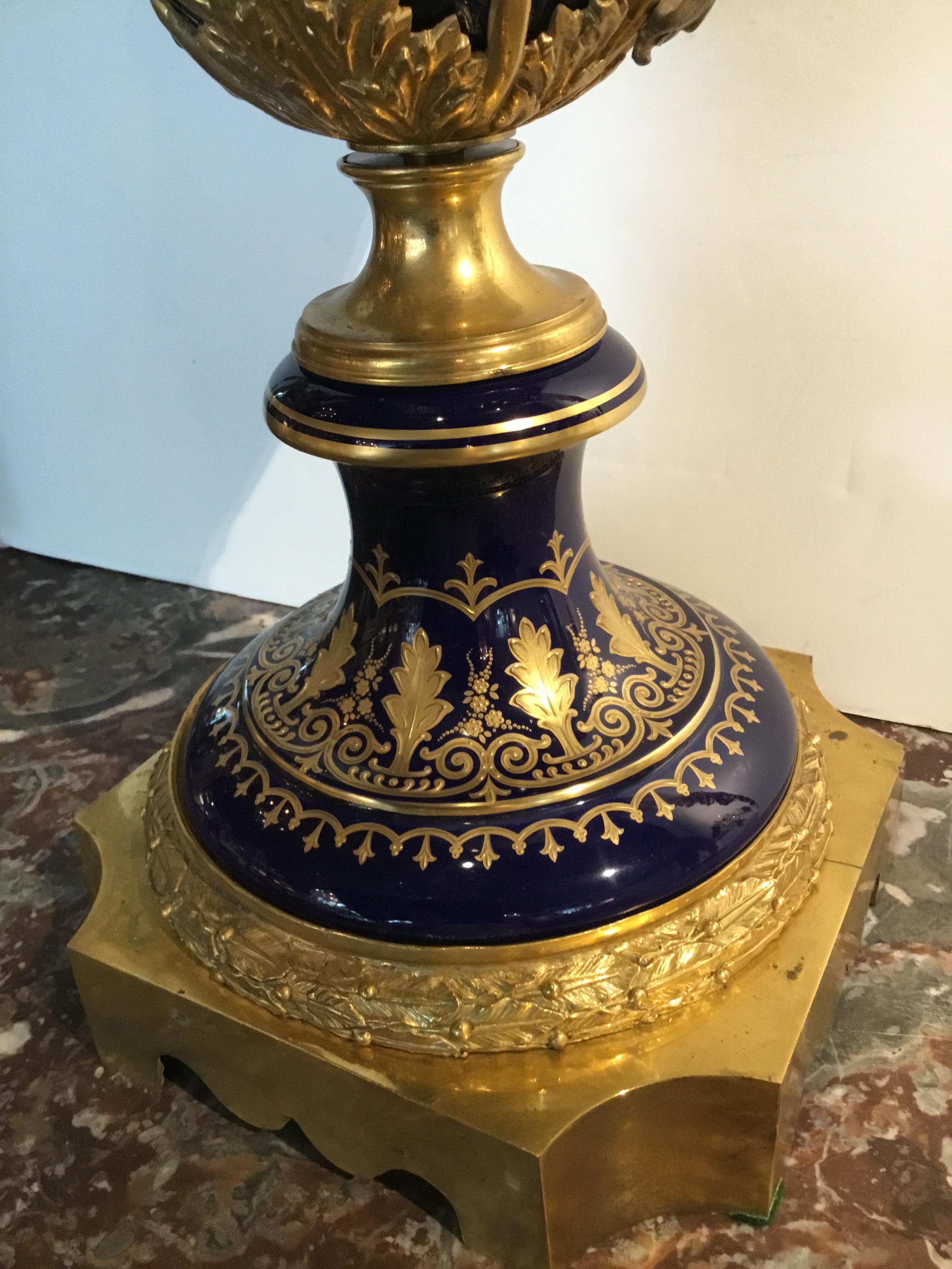French 19th Century Serves Porcelain Urn Mounted in Bronze Doré Mounts For Sale