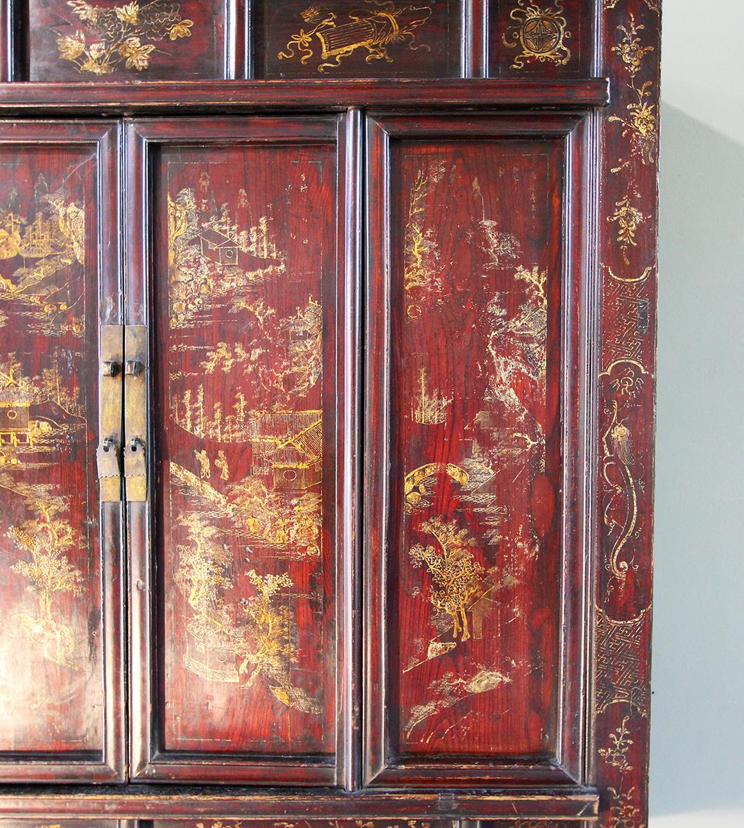 Chinese cabinet with two doors. Elmwood and lacquer and gold decorations with figures and pagodas.
China Shanxi Province, early 19th century.