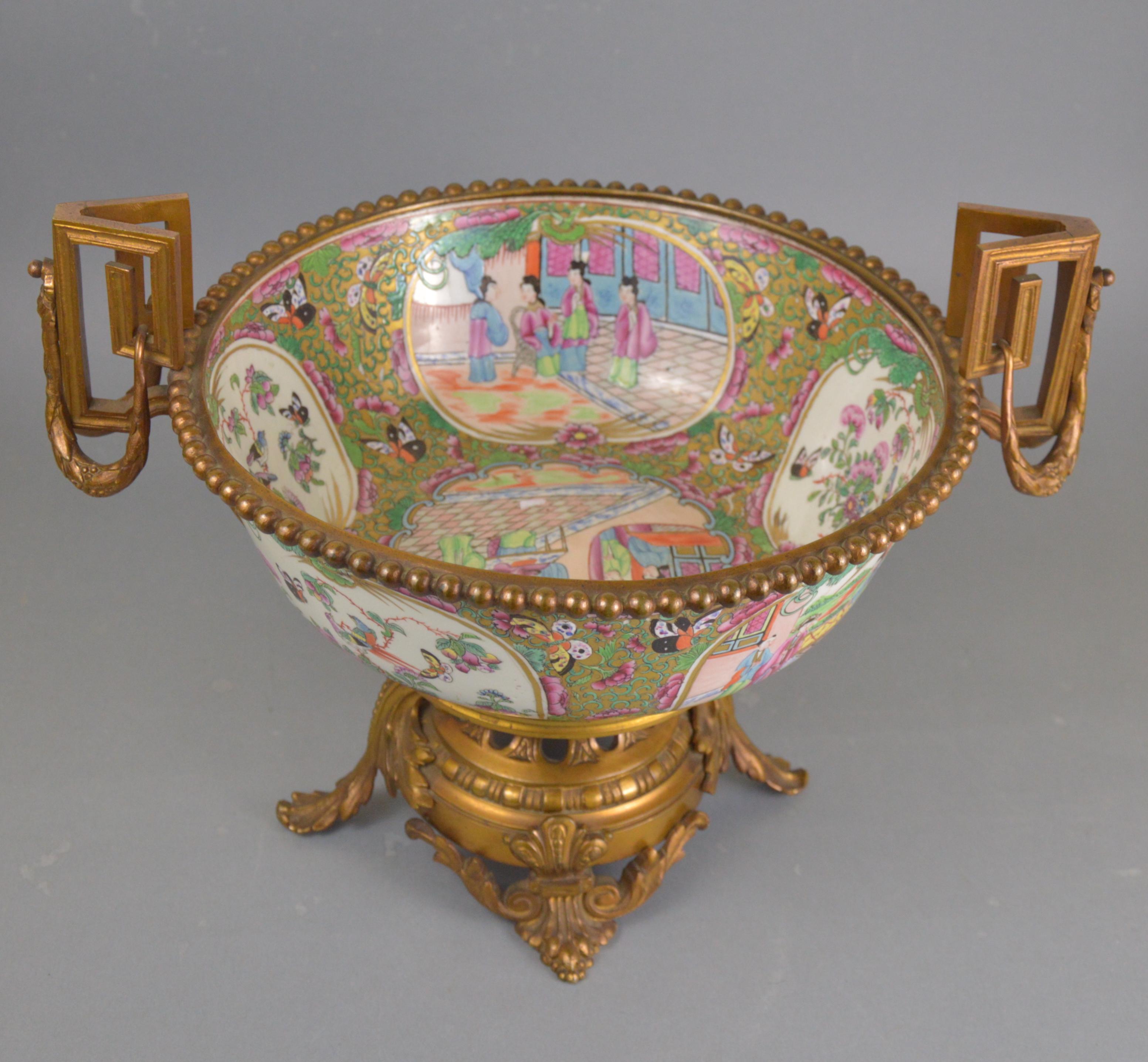 19th century. Chinese Gilt bronze mounted Canton polychrome enameled porcelain bowl. Fine quality medallion decoration of animated life scenes. Rose family.
Dimension: Ø (without handles) - 30 cm, height (with handles) - 28 cm.
