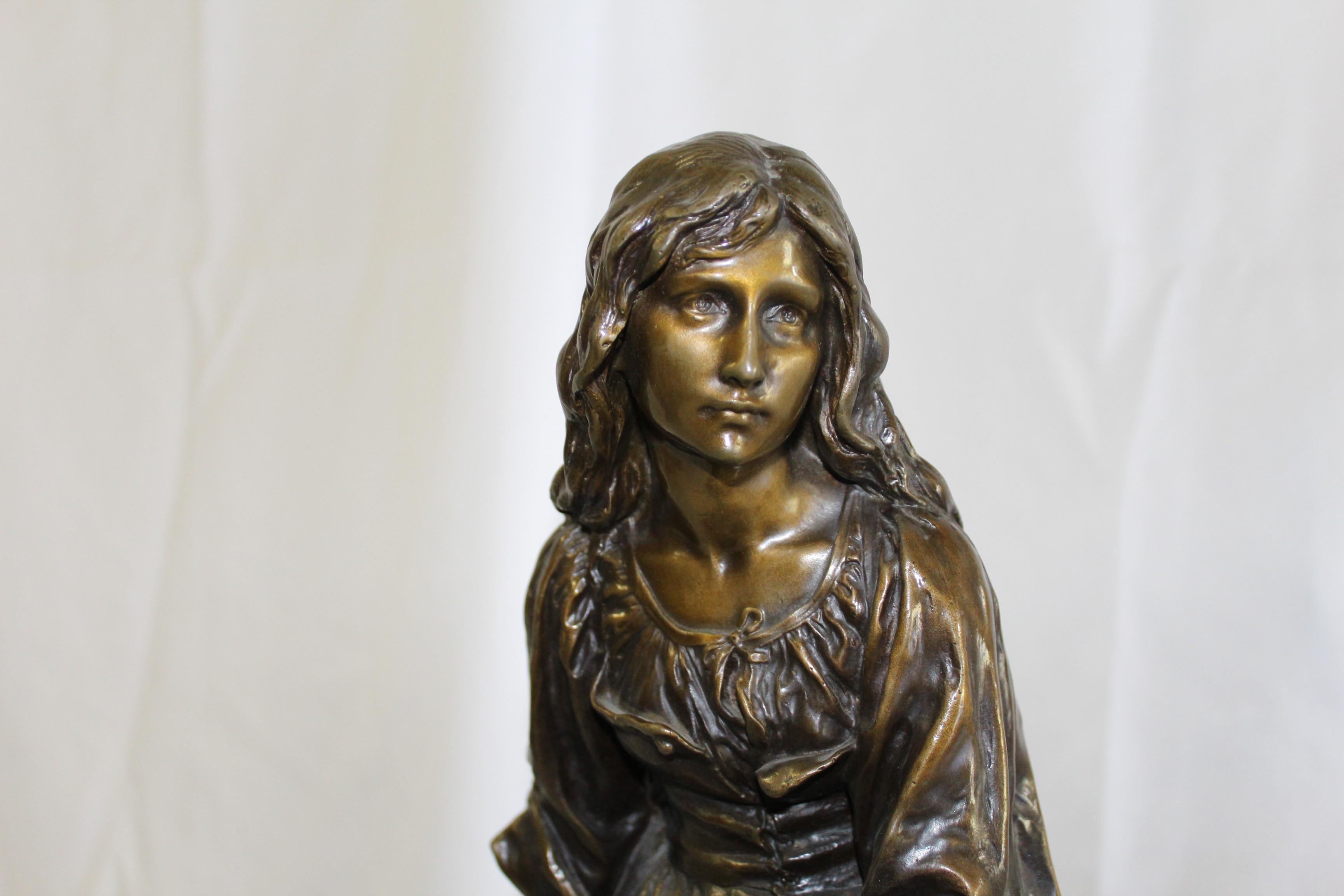 A 19Th Century Large and impressive bronze with golden bronze patina of a girl holding a musical instrument .Signed P. Mengin 1853-1937. in very good condition. Made with a base that does swivel ,see photos . The base is not the original and has