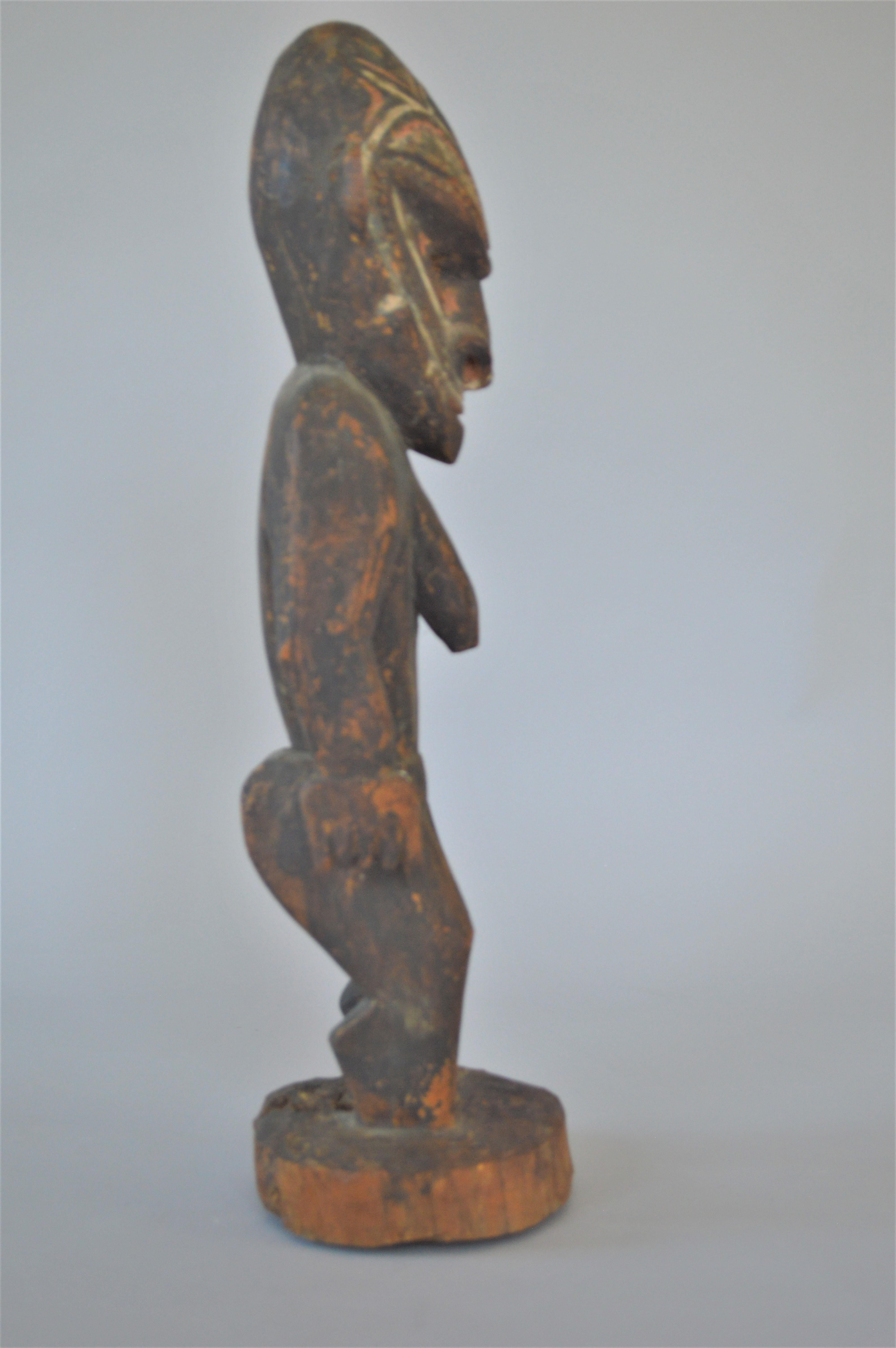 Papua New Guinean 19th Century New Guinea Wooden Female Figure For Sale