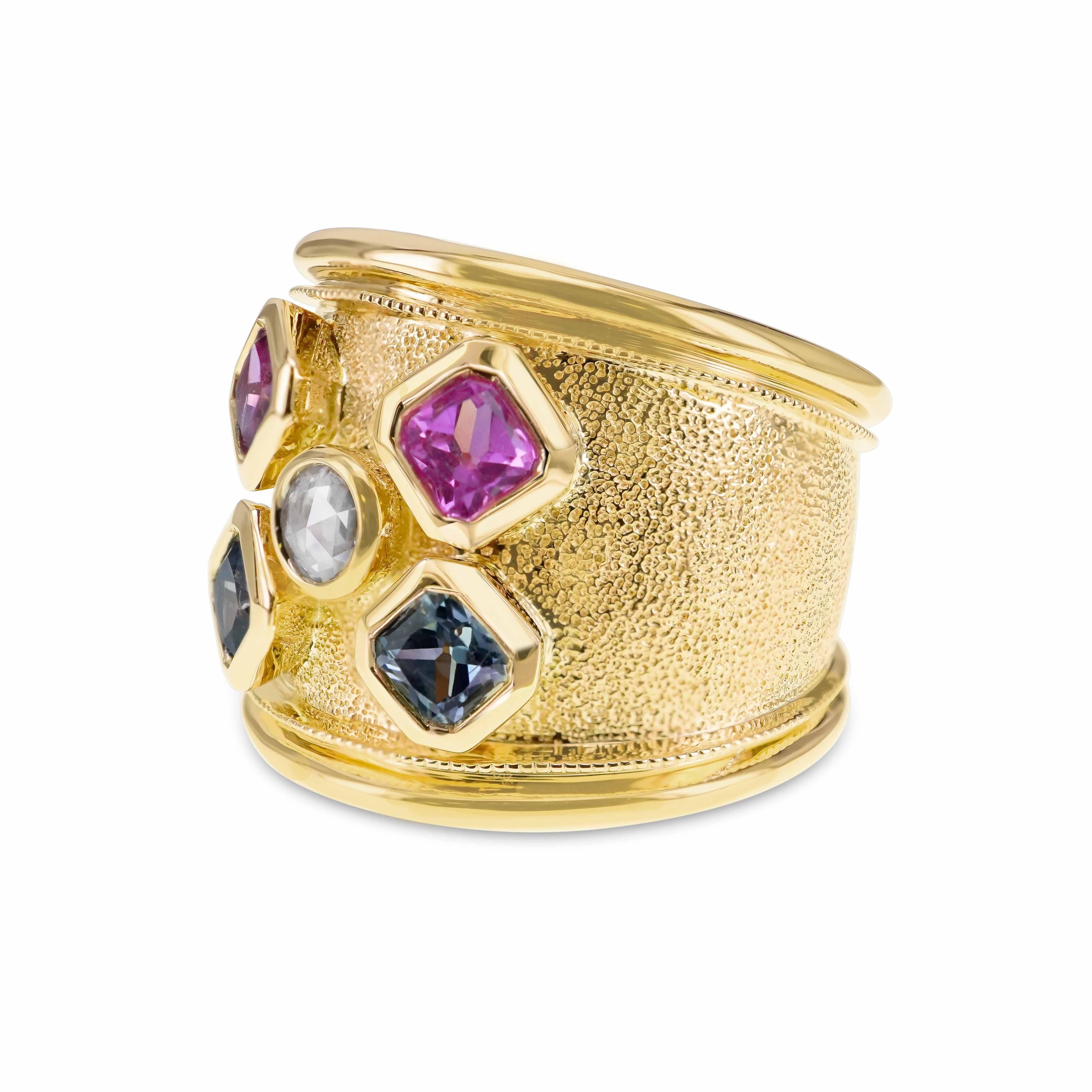 A beautiful ensemble of mix color no heat sapphire and diamond are set in this heavy 18K gold ring. The work on the gold is inspired by the works of the Italians. The gold weight is 15.18 grams and total diamond weight used in the ring is 0.27