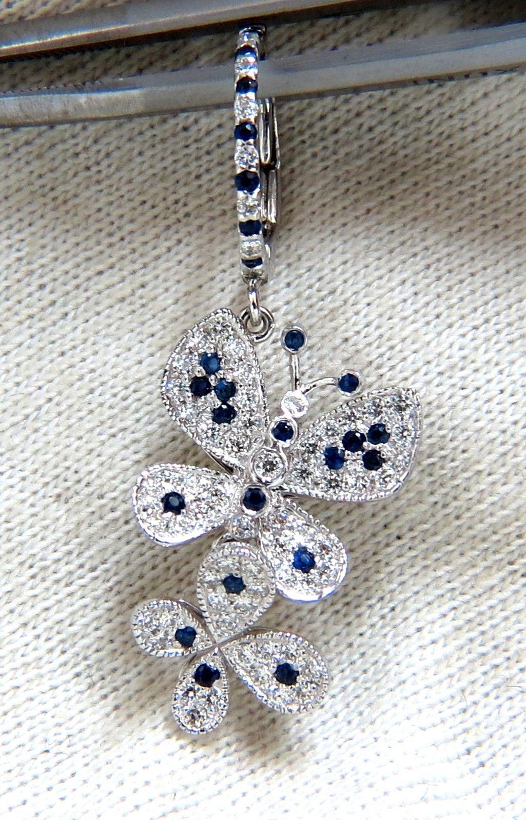 .70ct. Natural Sapphires & 

1.20ct. diamonds dangle butterfly earrings.

Sapphires: round cut, transparent & clean clarity.

Fully faceted & gorgeous vivid blues

 Side round diamonds: 

G-color, Vs-2 clarity.

14kt. white gold

6 grams.

overall: