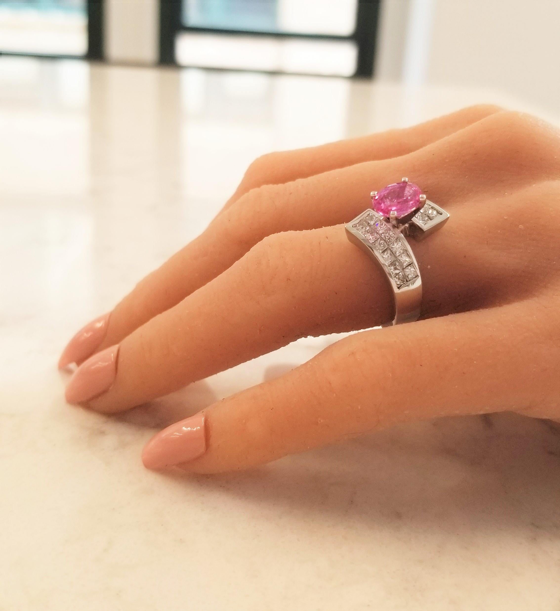 This modern bypass ring is crafted to set you apart from the crowd in every way! It is packed with elegance, grace, and timeless complexity. This lavish platinum, intense pink sapphire, and diamond ring serves up the perfect coverage for your hand.