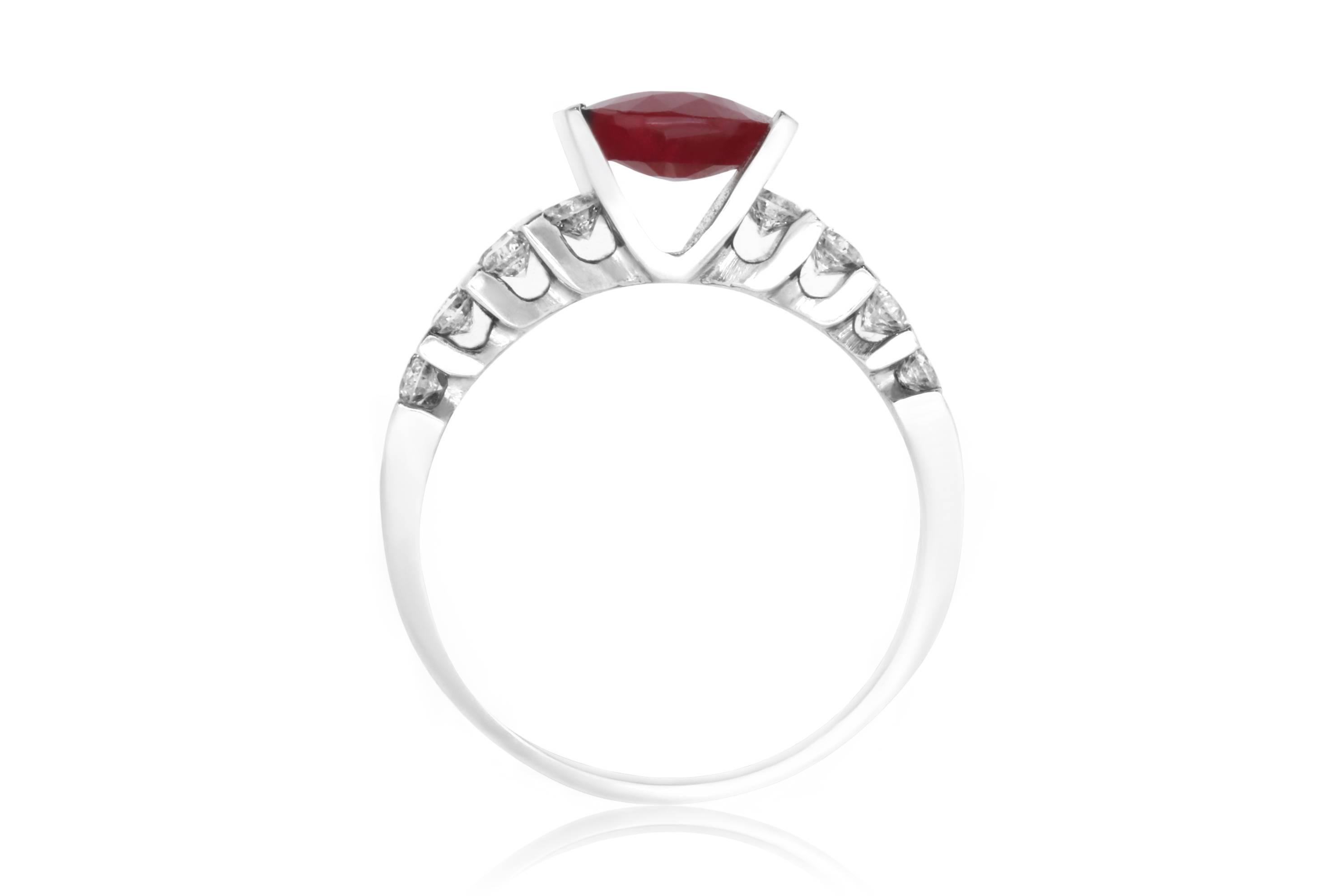 Material: 14k White Gold
Gemstones: 1 Oval Ruby at 1.90 Carats.
Diamonds: 24 Brilliant Round White Diamonds at 0.90 Carats. SI Clarity / H-I Color. 
Ring Size: 5.75. Alberto offers complimentary sizing on all rings.

Fine one-of-a kind craftsmanship