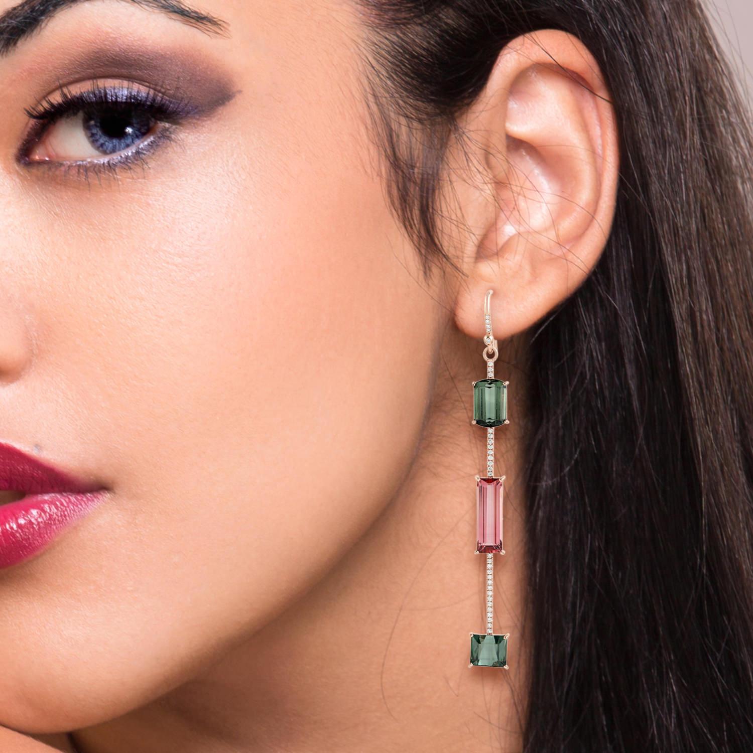 These beautiful linear drop earring are handcrafted in 18-karat gold. It is set with 19.0 carats tourmaline and .35 carats of glimmering diamonds.

FOLLOW  MEGHNA JEWELS storefront to view the latest collection & exclusive pieces.  Meghna Jewels is
