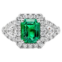1.90 Carats Emerald Cut Green Emerald & Diamond Three Stone Halo Engagement Ring