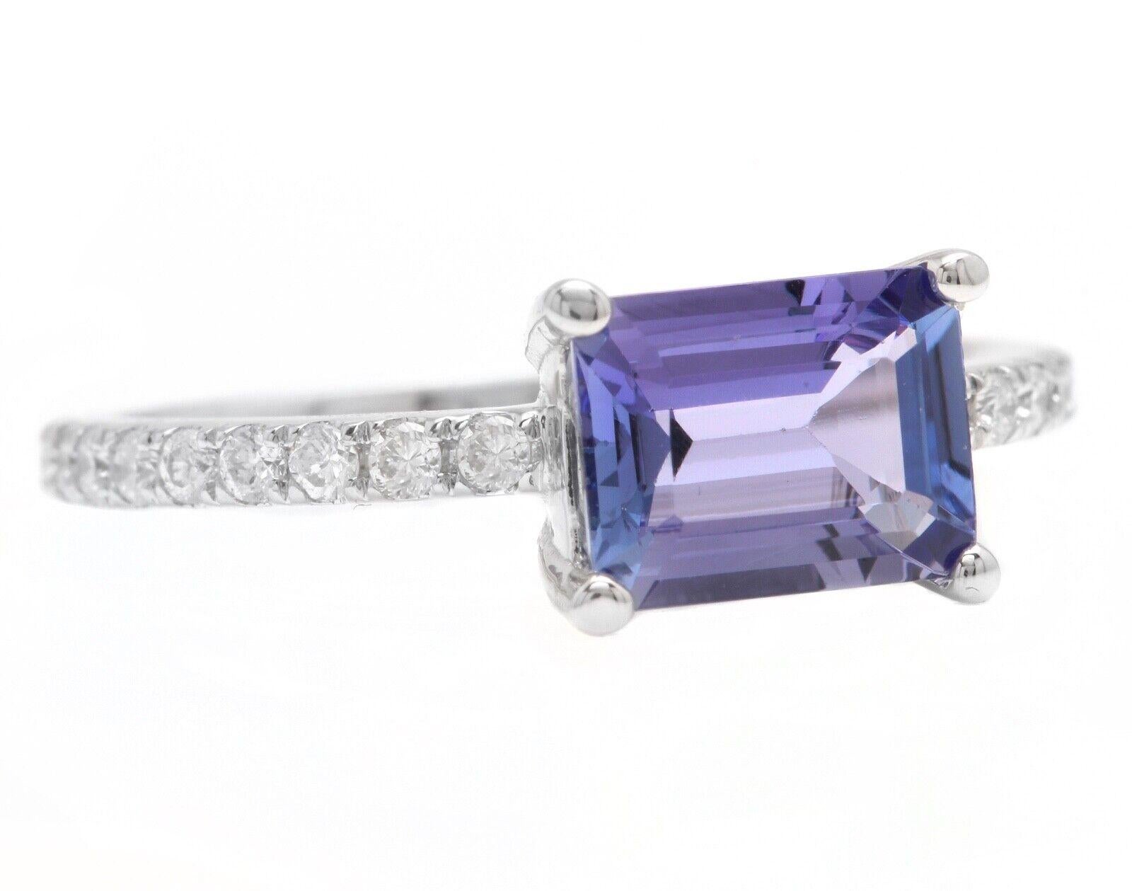1.90 Carats Natural Very Nice Looking Tanzanite and Diamond 14K Solid White Gold Ring

Suggested Replacement Value: Approx.  $3,500.00

Total Natural Emerald Cut Tanzanite Weight is: Approx.  1.58 Carats

Tanzanite Measures: Approx. 8.00 x 6.00mm
