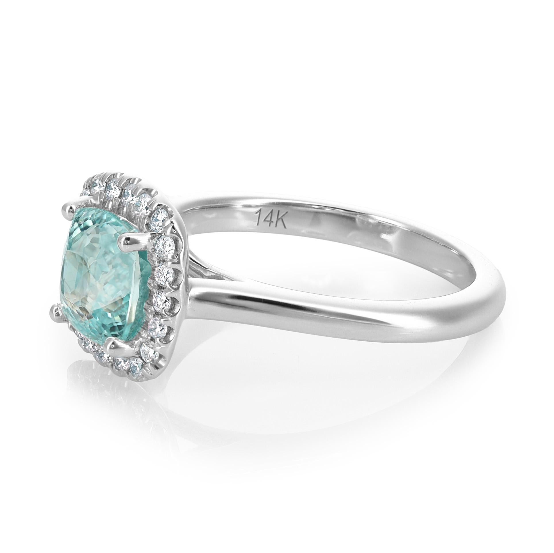 Indulge in timeless beauty with this 14K White Gold Ring featuring 1.90 carats natural Paraiba Tourmaline in an elegant oval shape. The vibrant blue-green hues of the Paraiba Tourmaline are enhanced through a carefully applied heating process,
