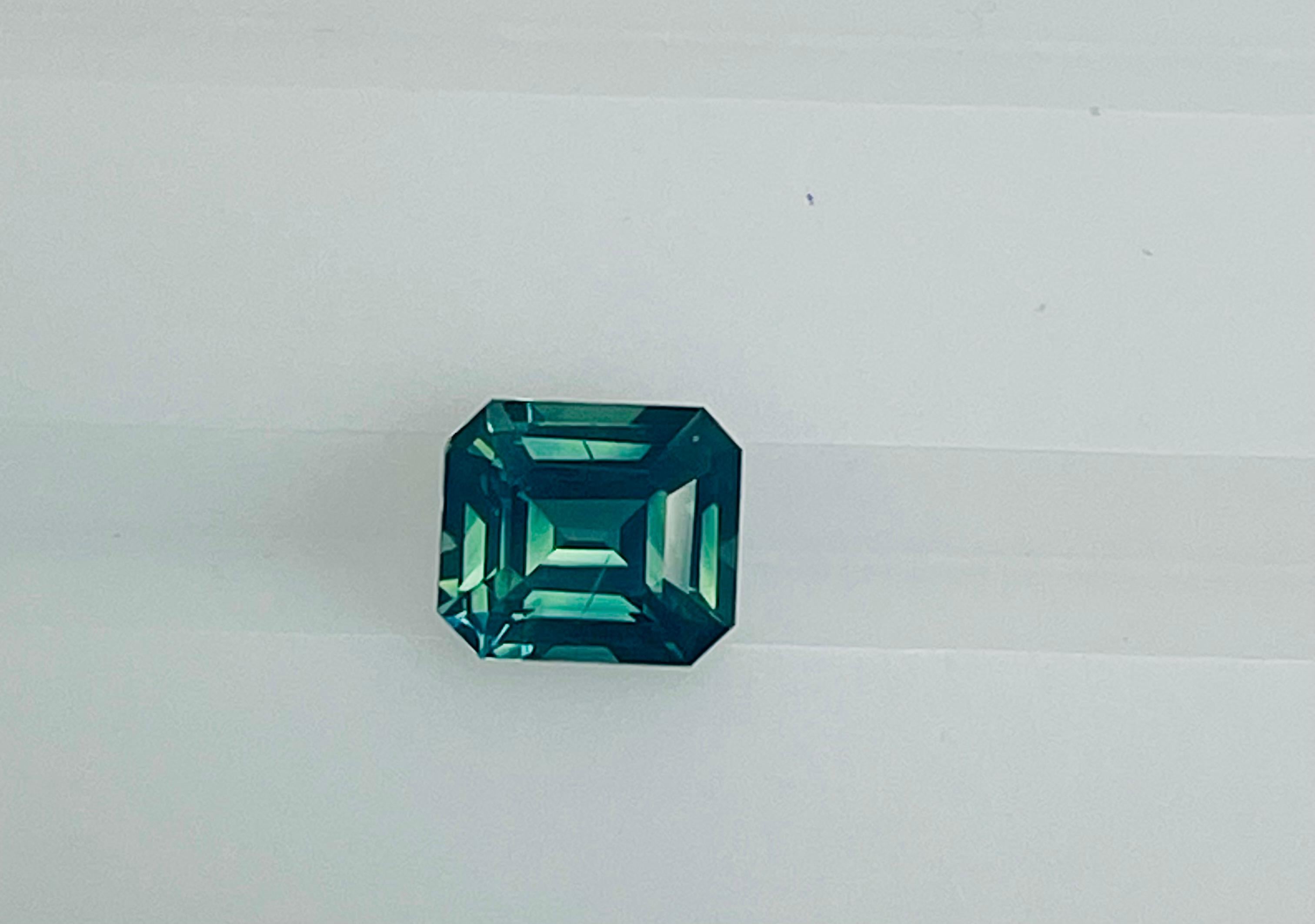 This 1.90 Ct Emerald cut Green Sapphire exhibits beautiful mix of blue and green color which is also referred to as Teal color Sapphire., it is beautifully cut and exhibits great color .