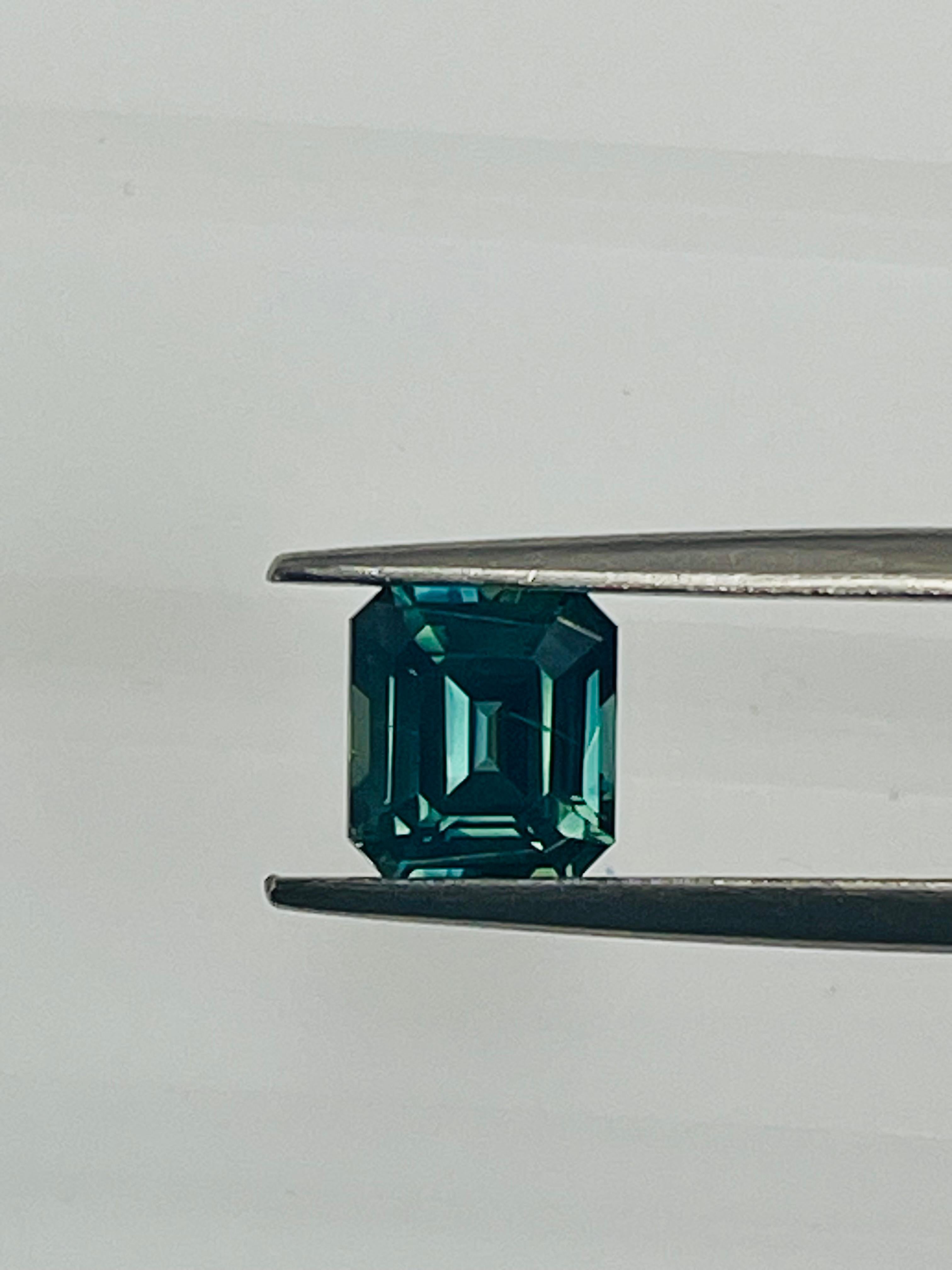 Women's or Men's 1.90 Ct Emerald cut Green Teal color Sapphire  For Sale
