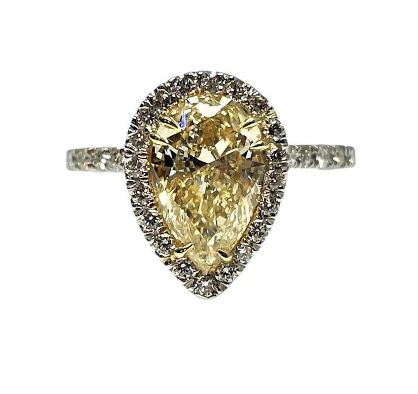 yellow diamond halo engagement ring