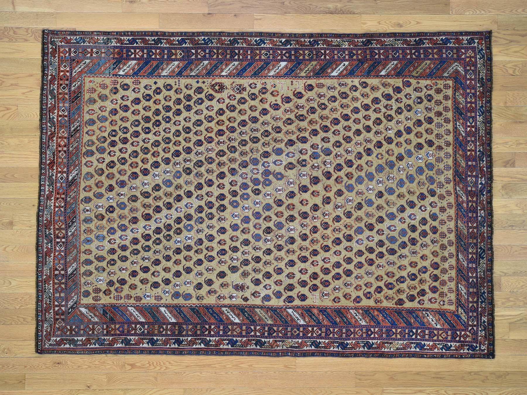 This is a genuine hand knotted oriental rug. It is not hand tufted or machine made rug. Our entire inventory is made of either hand knotted or handwoven rugs.

Start a new room with this superb antique carpet. This handcrafted Persian Afshar, is