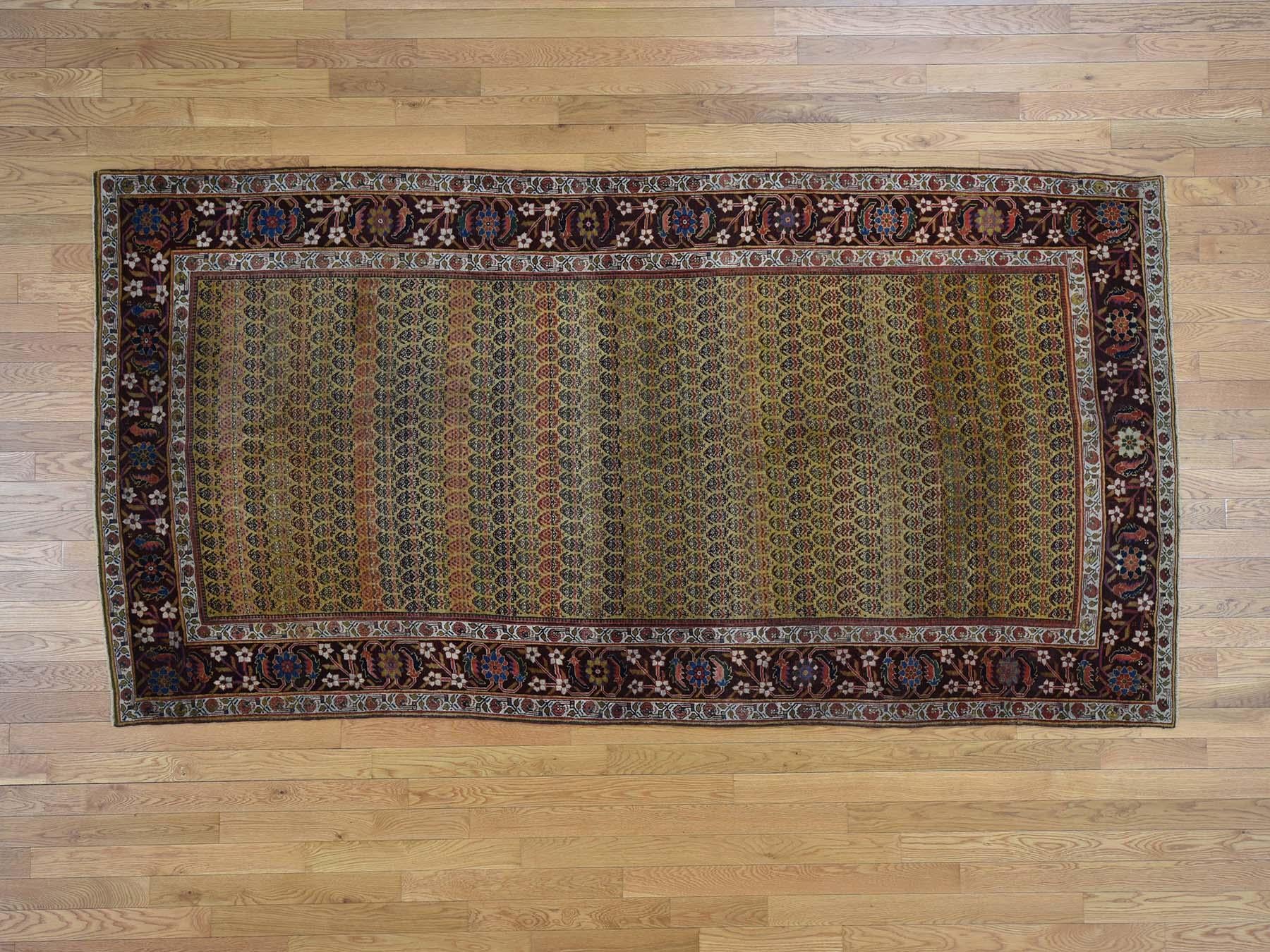 This is a genuine hand knotted oriental rug. It is not hand tufted or machine made rug. Our entire inventory is made of either hand-knotted or hand-woven rugs.

Decorate your home with this high quality antique carpet. This handcrafted Persian