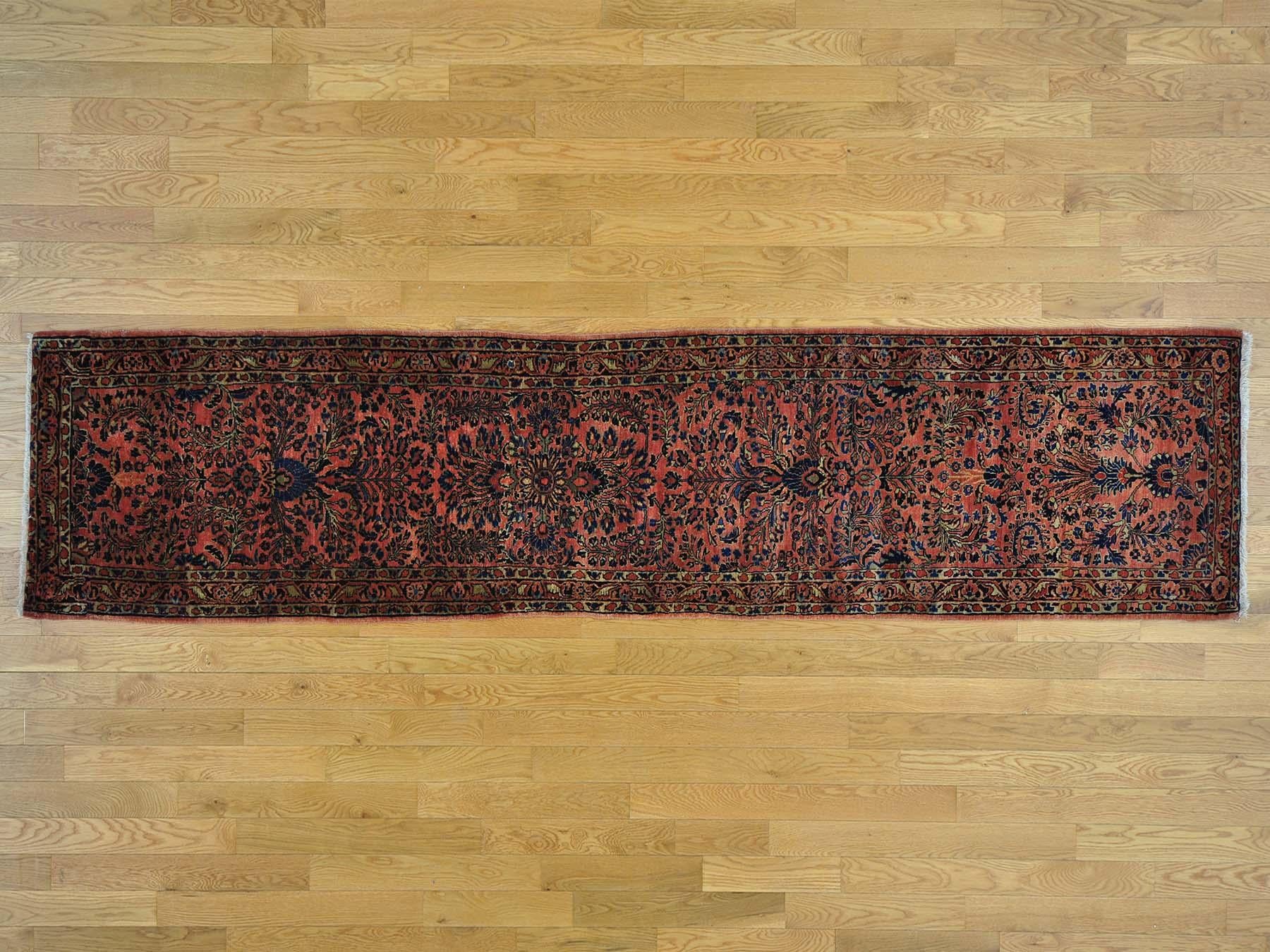 This is a genuine hand knotted oriental rug. It is not hand tufted or machine made rug. Our entire inventory is made of either hand knotted or handwoven rugs.

Start a new room with this superb antique carpet. This handcrafted Persian Sarouk