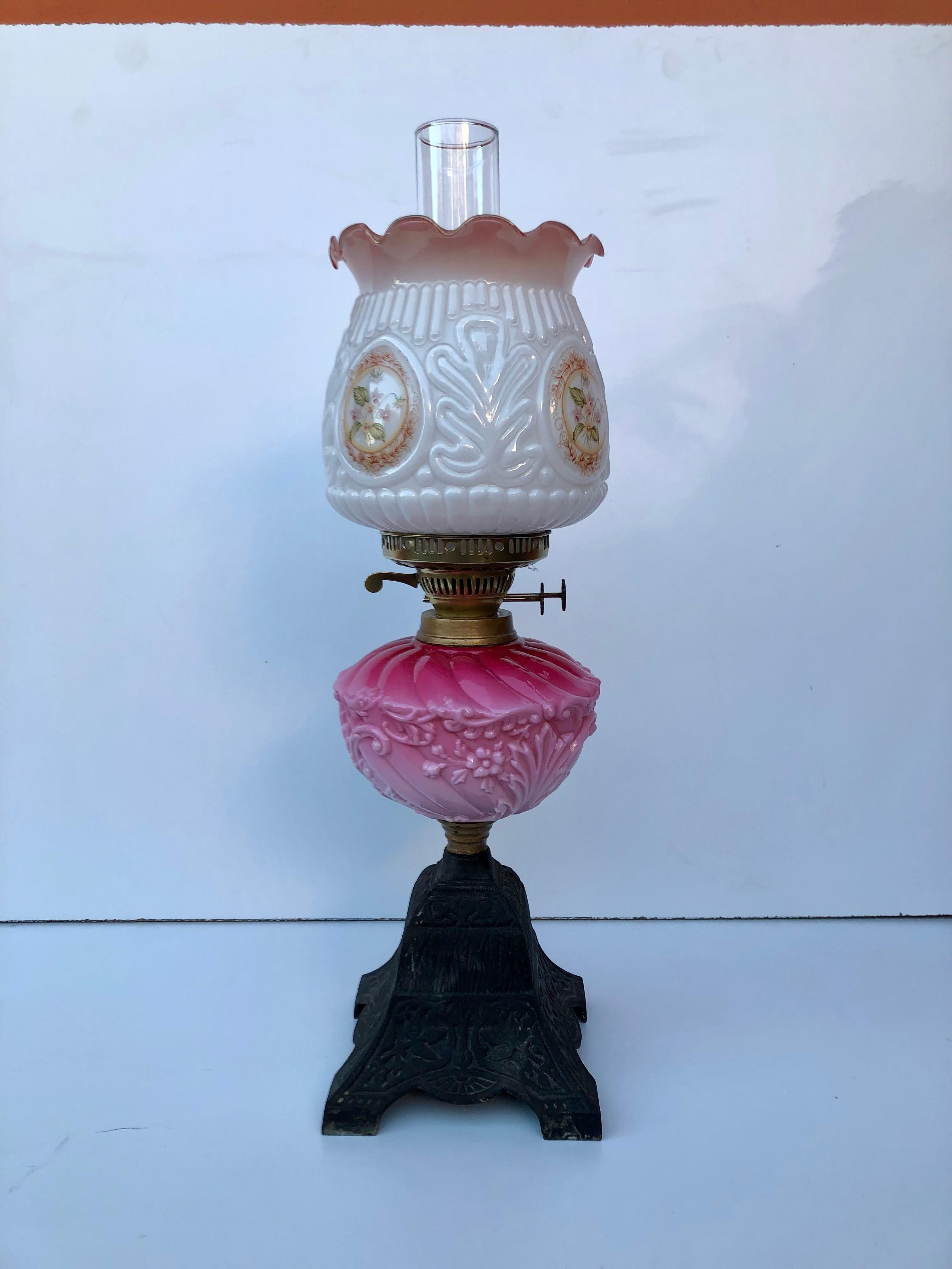Victorian oil lamp with milk glass.
Fully working, with 2 burner.
Base is from iron metal.
Middle parts from milk glass.
Top parts hand painting on the glass shade.
 