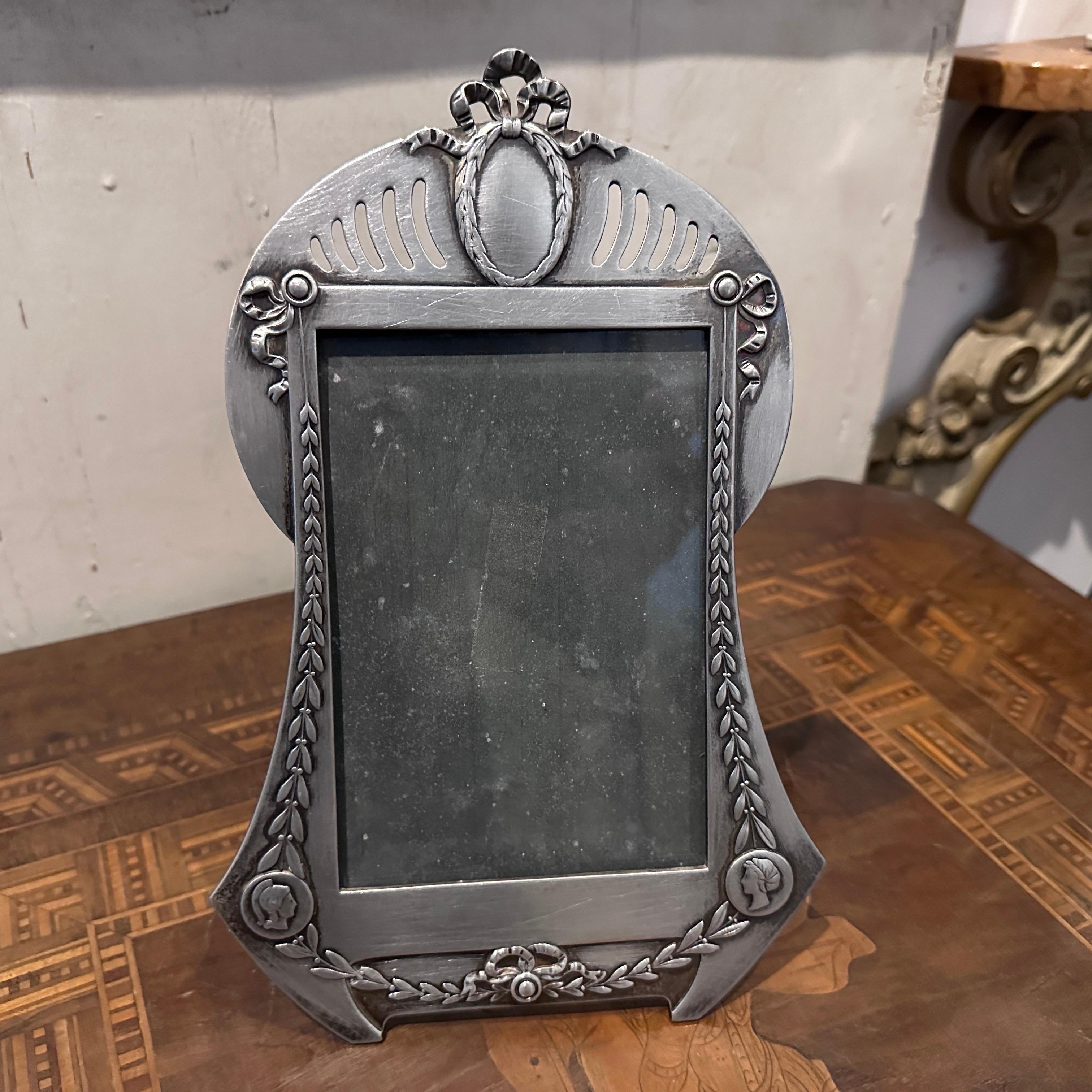 A beautiful Art Nouveau picture frame designed and manufactured in Germany by W.M.F. in early 20th century. It's marked on the back side and with 216, number of the W.M.F. catalogue of the period. This picture frame by W.M.F. is an exquisite example