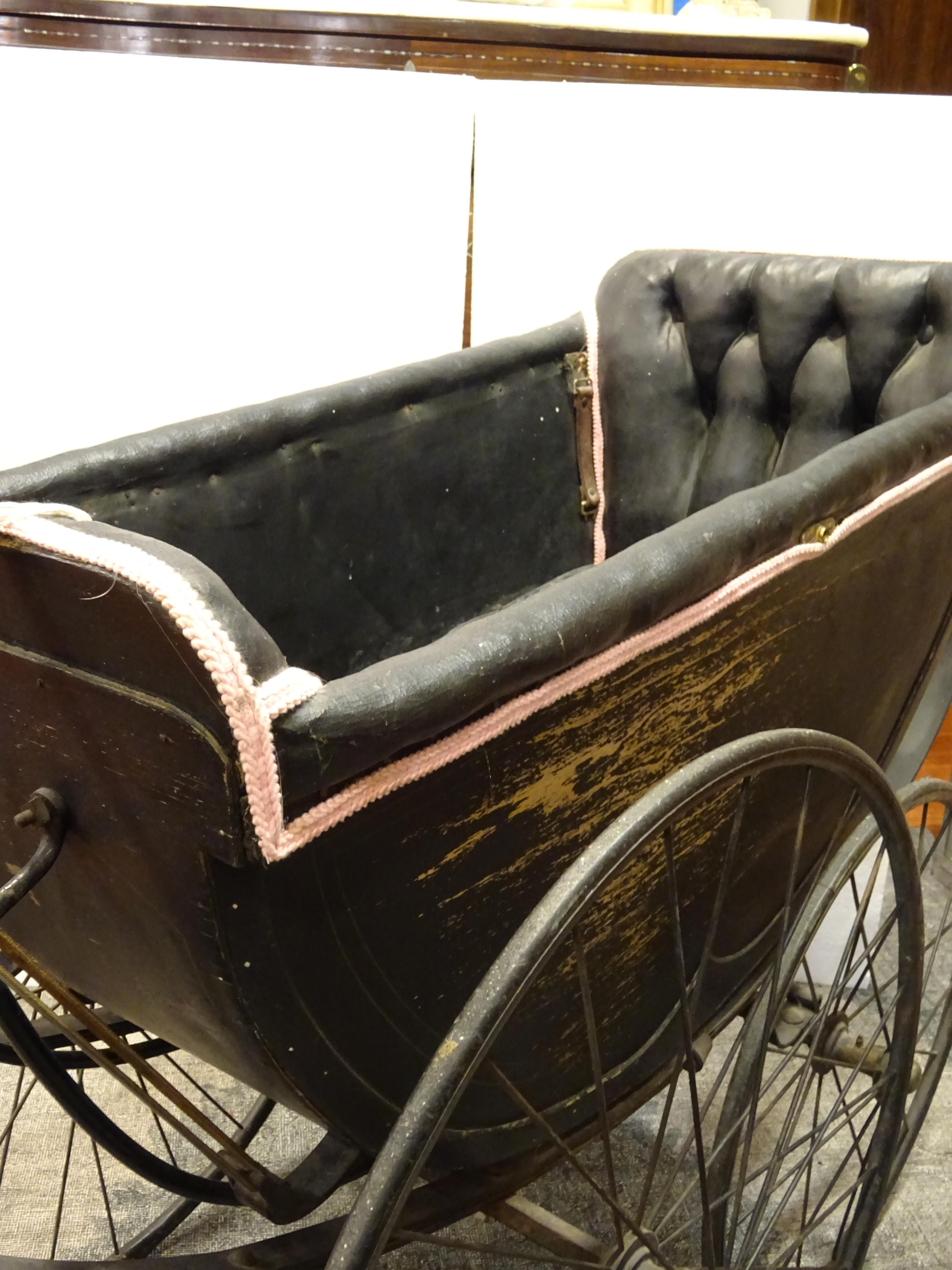 1900 Black and Pink French Wood, Iron and Leather Capitone Baby Trolley 11