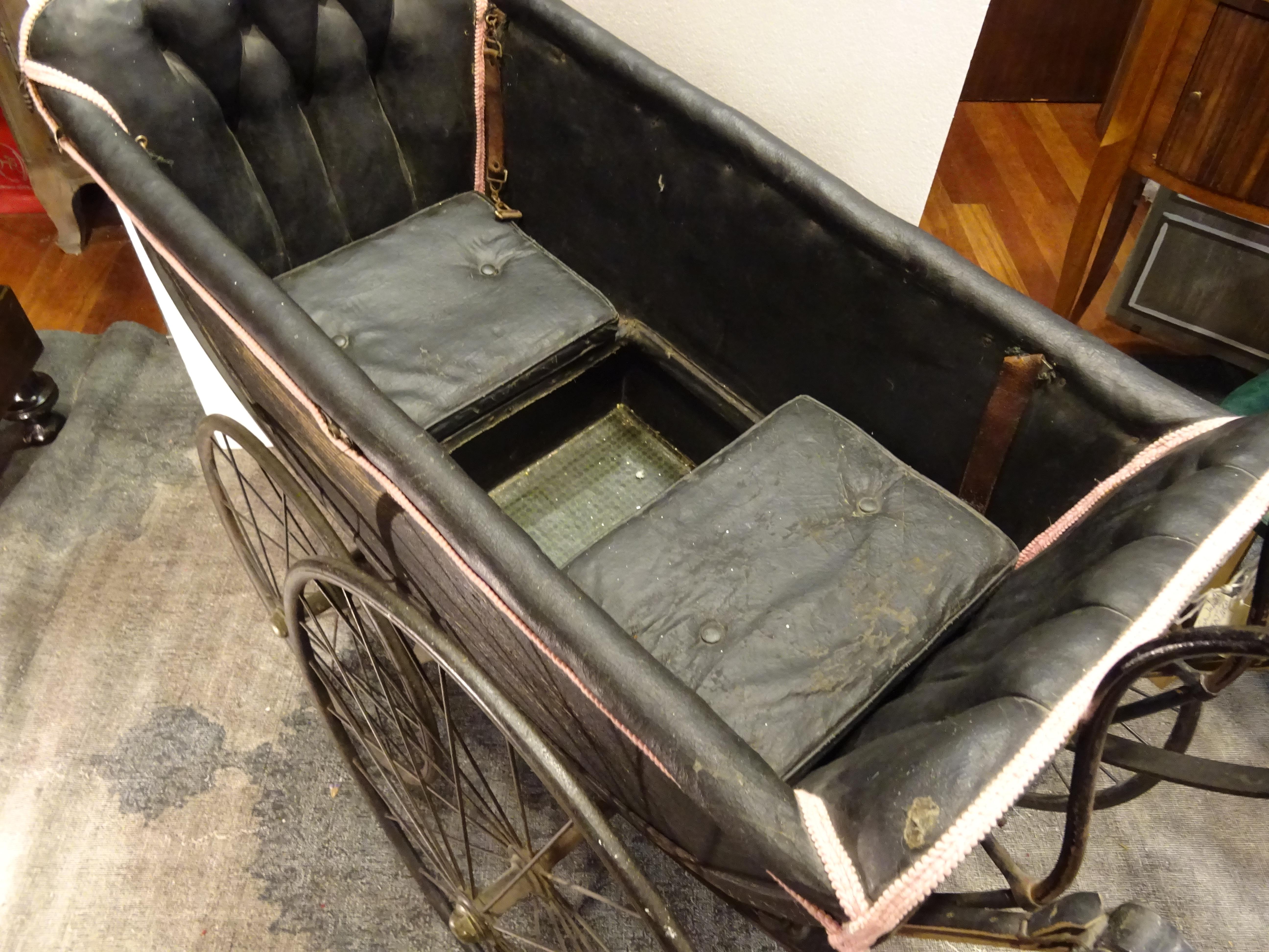 Early 20th Century 1900 Black and Pink French Wood, Iron and Leather Capitone Baby Trolley