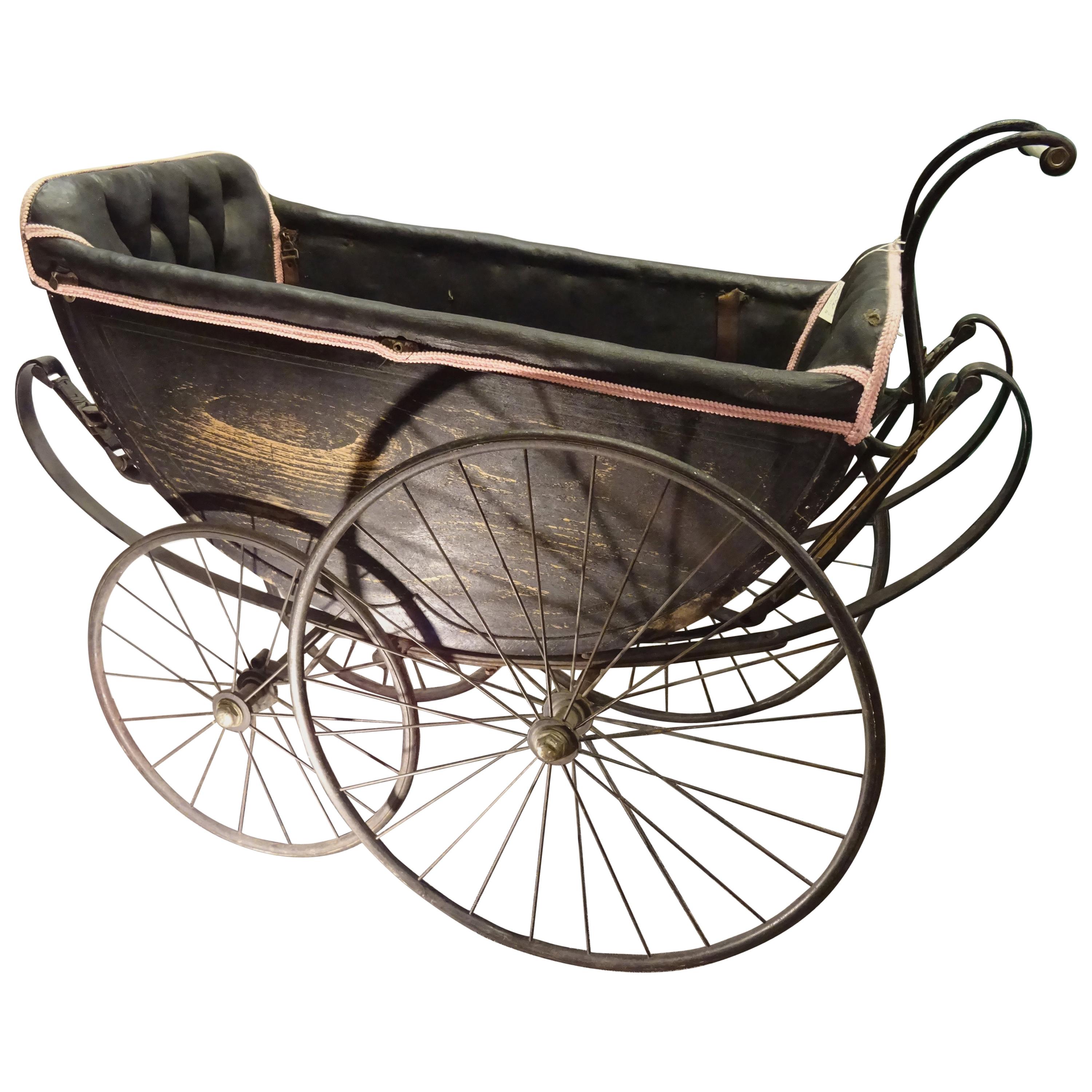 1900 Black and Pink French Wood, Iron and Leather Capitone Baby Trolley