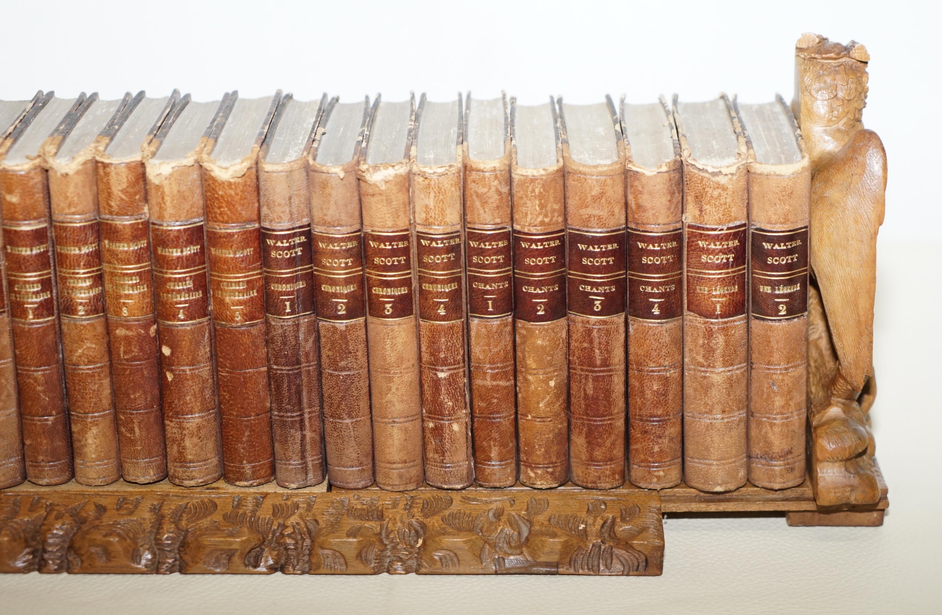 Early 20th Century 1900 Black Forest Owl Carved Wood Extending Bookshelf Sir Walter Scott Books For Sale