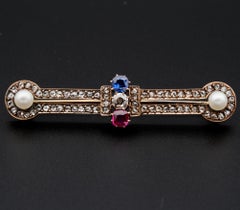 Etruscan Revival Diamond Ruby Sapphire Pearl Fibula Bar Brooch, circa 1900