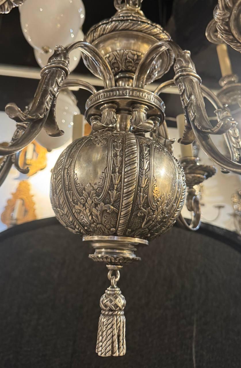 Circa 1900 Caldwell silver plated bronze small chandelier with 6 lights. Engraved flowers on body and cups