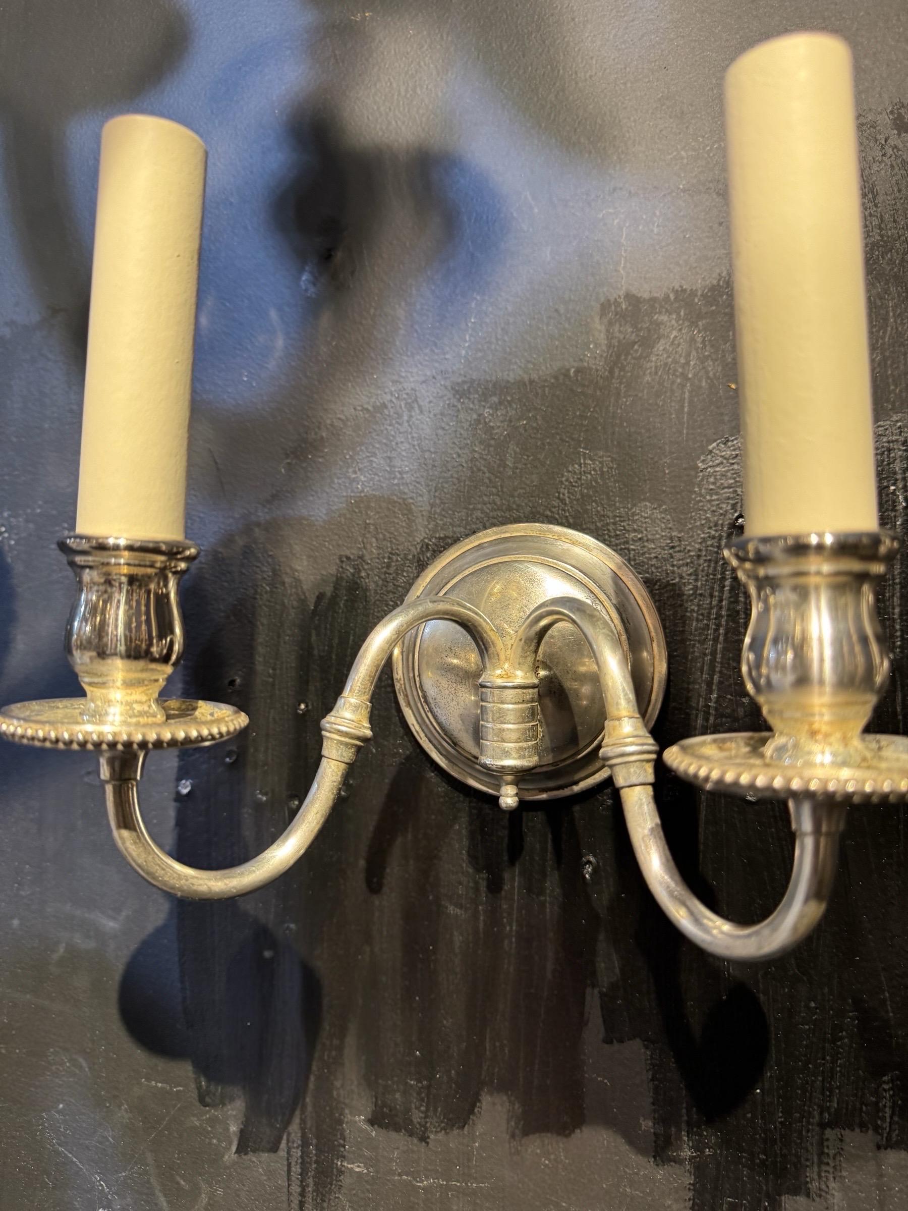 Circa 1900 Caldwell silver plated bronze sconces small size and simple design. Two lights 