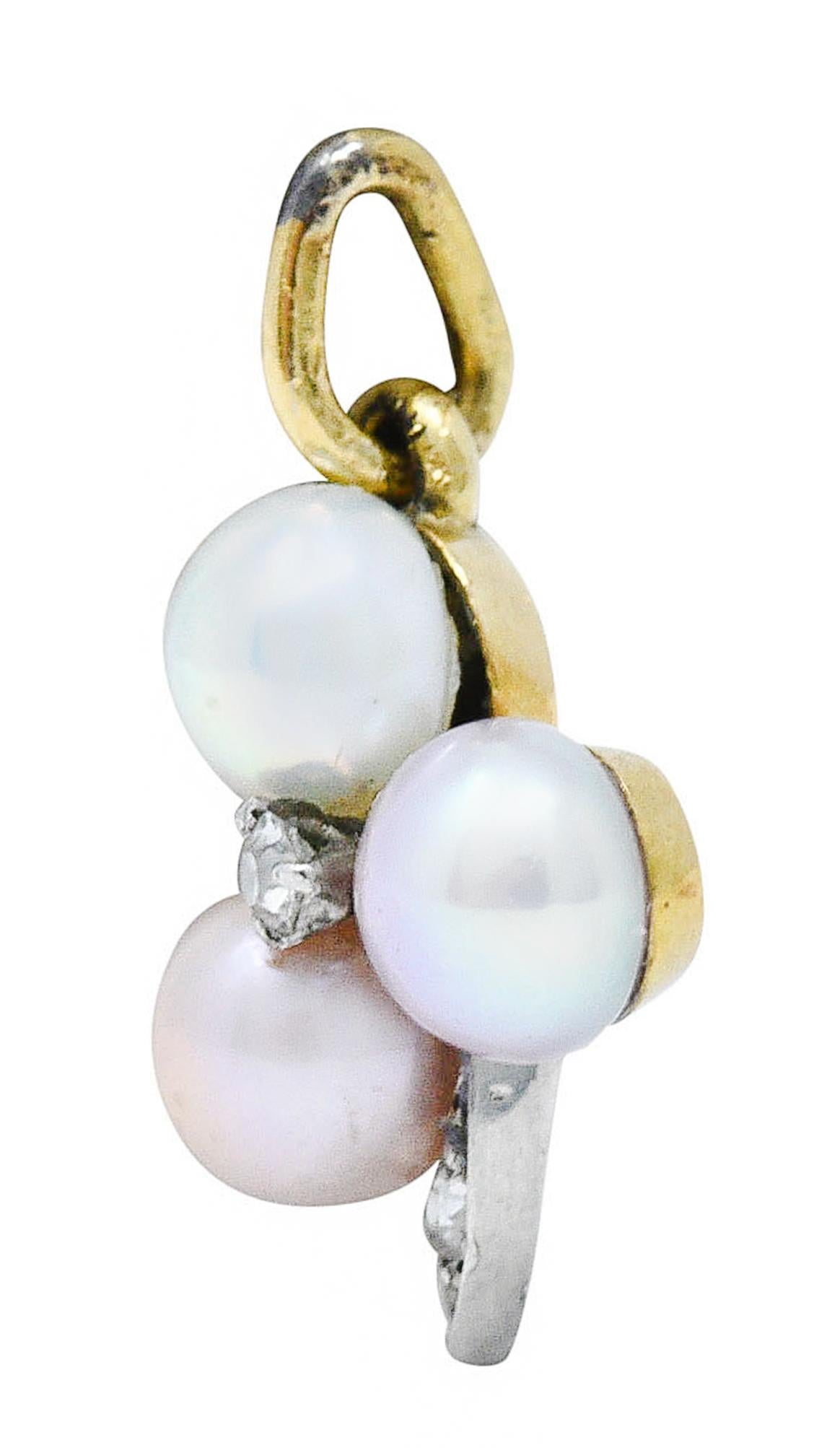 Clover charm is comprised of three 4.2 mm button pearls

Exhibiting strong rosè and iridescent overtones with excellent luster

With single and transitional cut diamonds weighing in total approximately 0.05 - eye clean and white

Tested as platinum