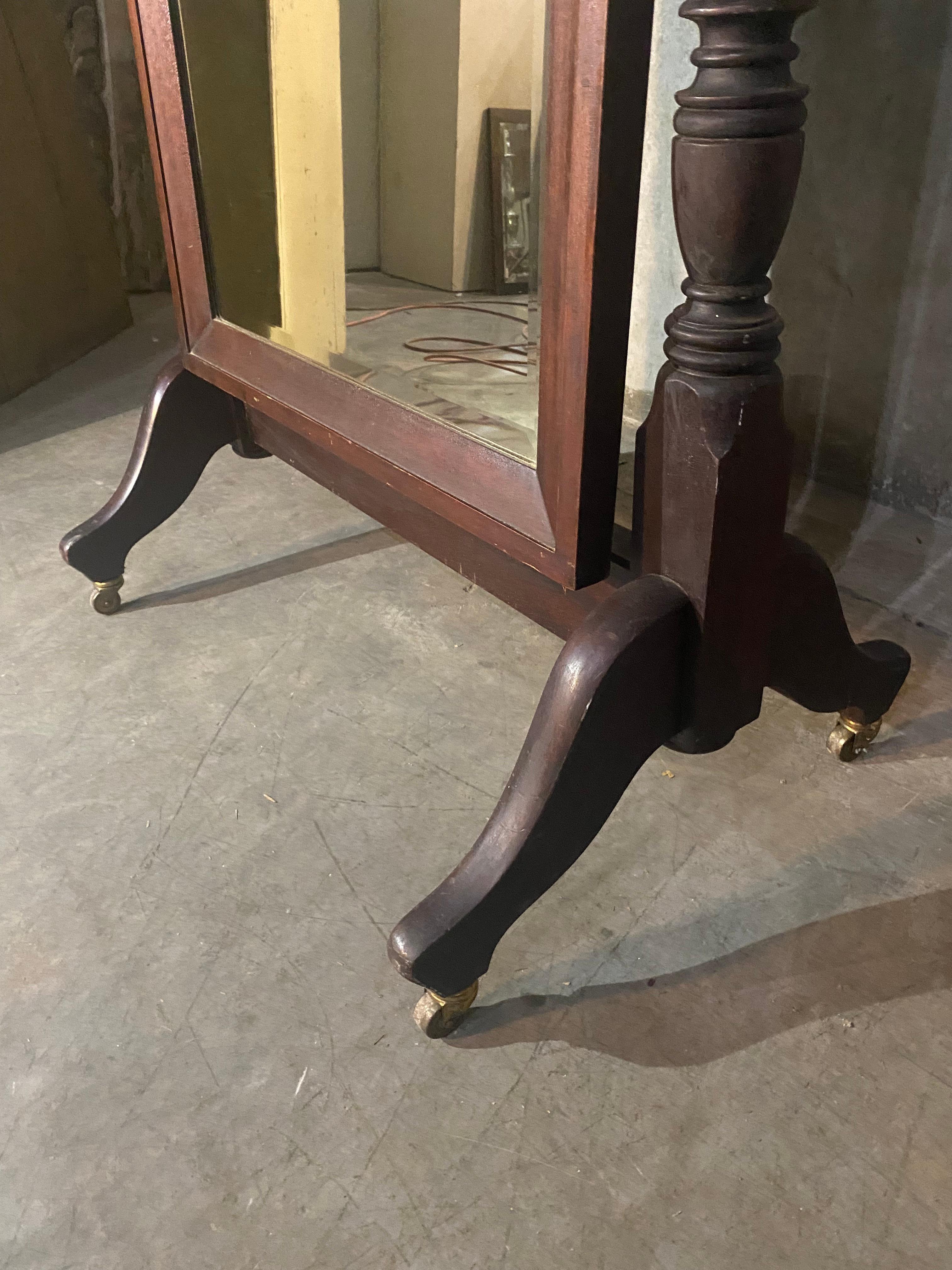 A wonderful untouched example showing original finish, bevelled original mirror curved corners and brass details. 

Acquired from a private collection.