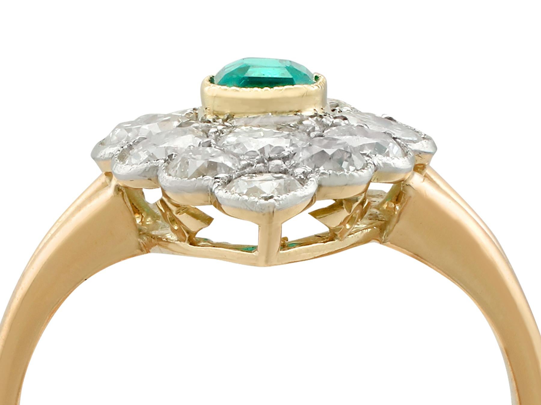 A stunning antique 1900's 0.55 carat emerald and 2.66 carat diamond, 15 carat and 22k gold dress ring; part of our diverse antique jewellery collections.

This stunning fine and impressive diamond and emerald ring has been crafted in 15k yellow and