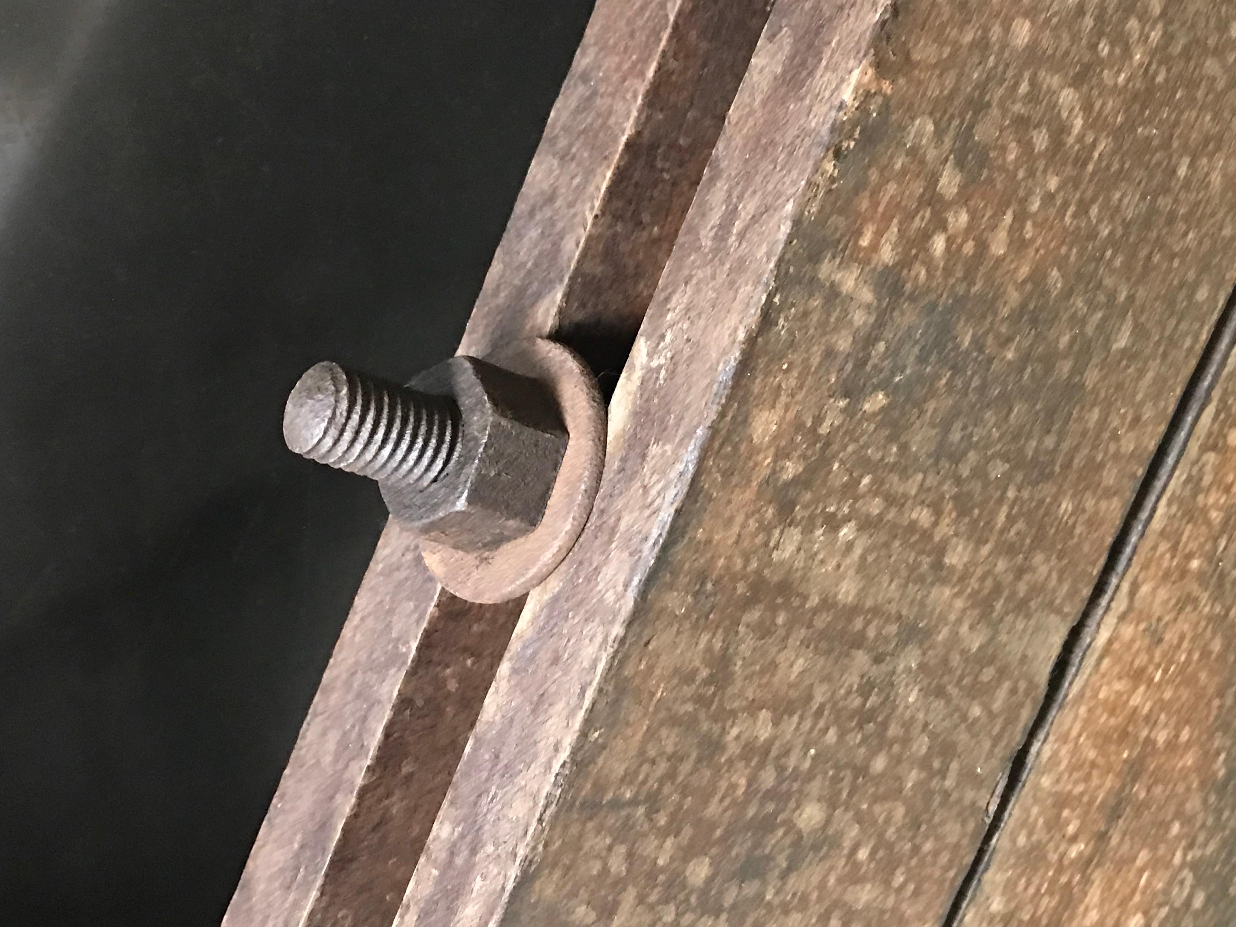 An industrial wooden wheel. Originating in France, dating to 1900. 
