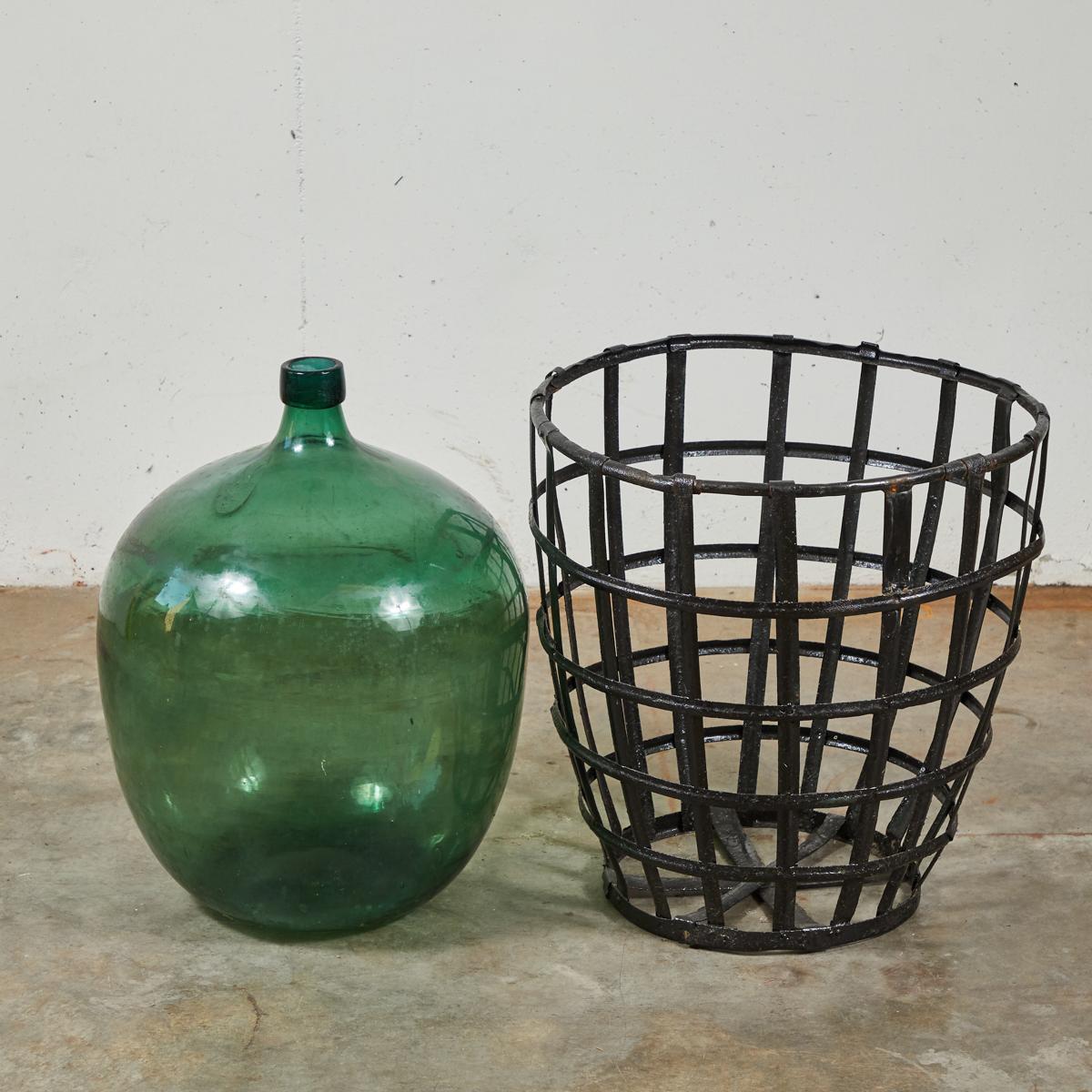 Early 20th Century French Metal Baskets with Bottles in Clear and Green Glass For Sale 1