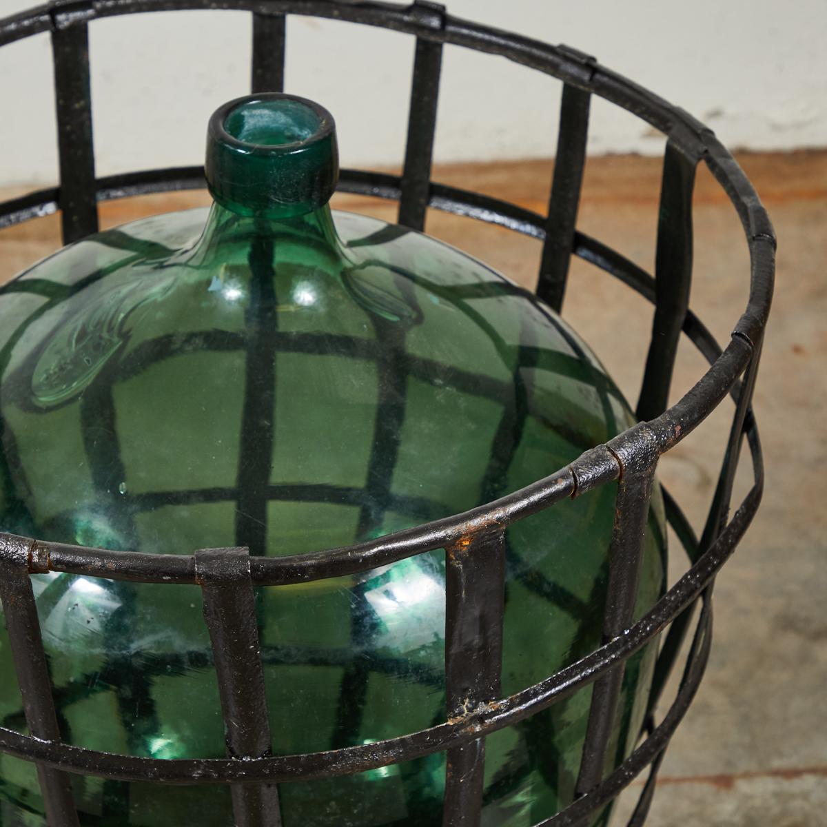 Early 20th Century French Metal Baskets with Bottles in Clear and Green Glass For Sale 3