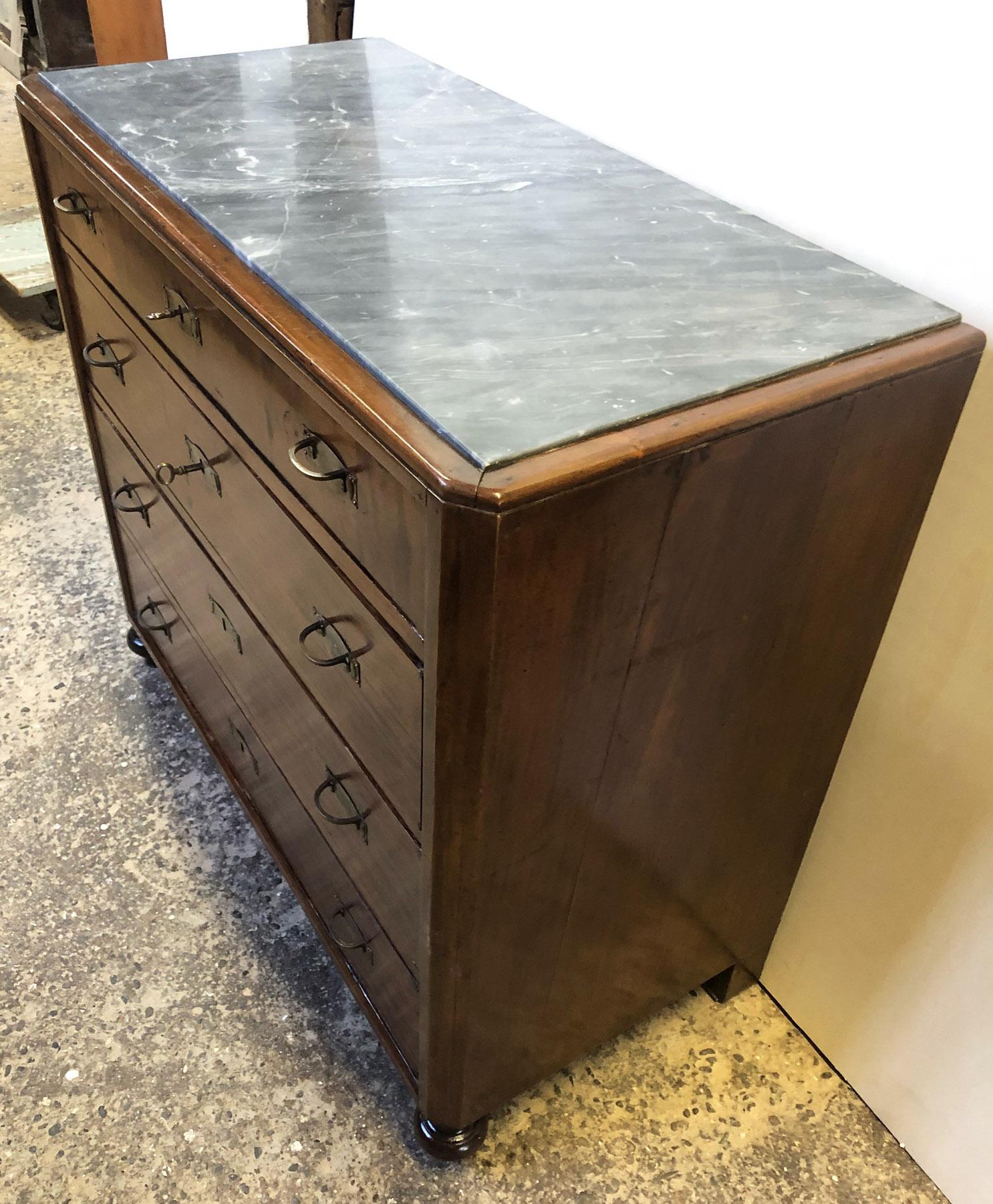 antique dresser with small drawers on top