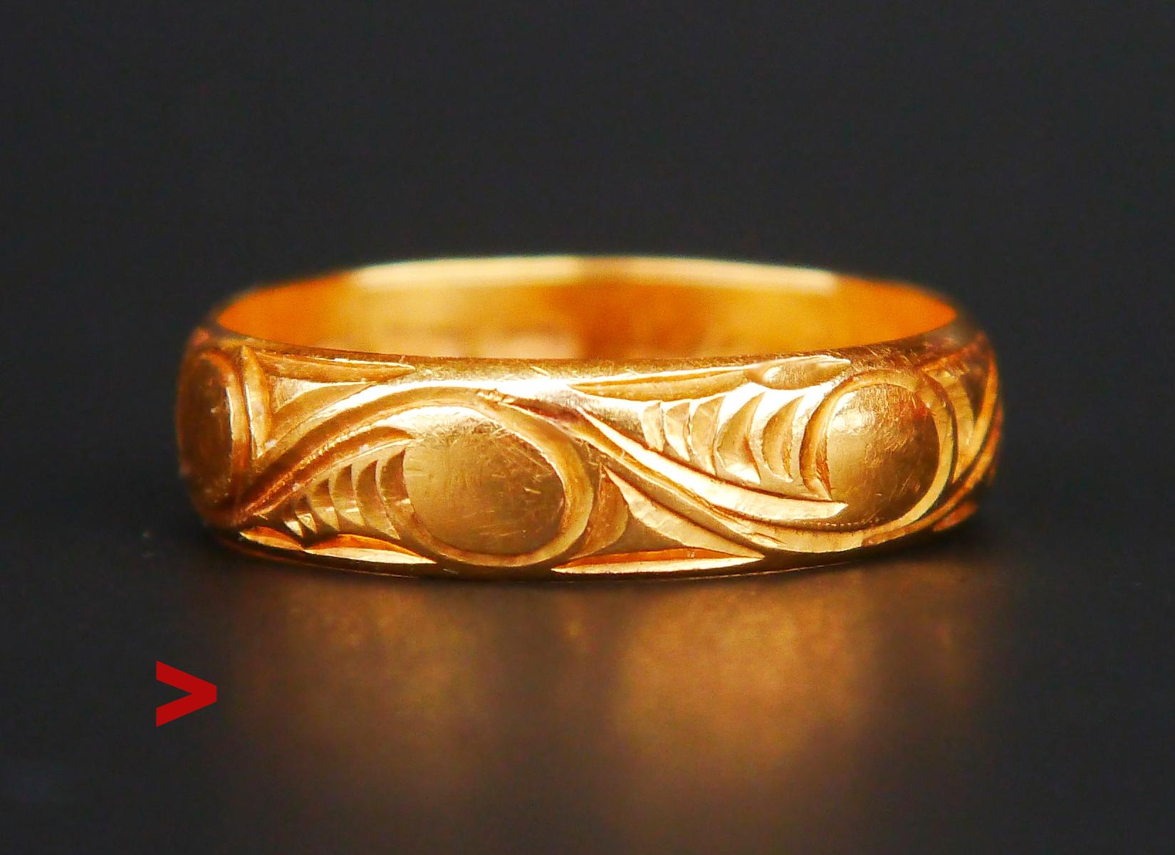 Antique Wedding Ring for Men or Women in solid 20K Yellow Gold. Engraved continuous wavy ornament around the band.

Made in Sweden. Workshop of Jeweler Andersson Gust, city of Varberg, active between 1887 and 1925.

Year mark: X6 / made in