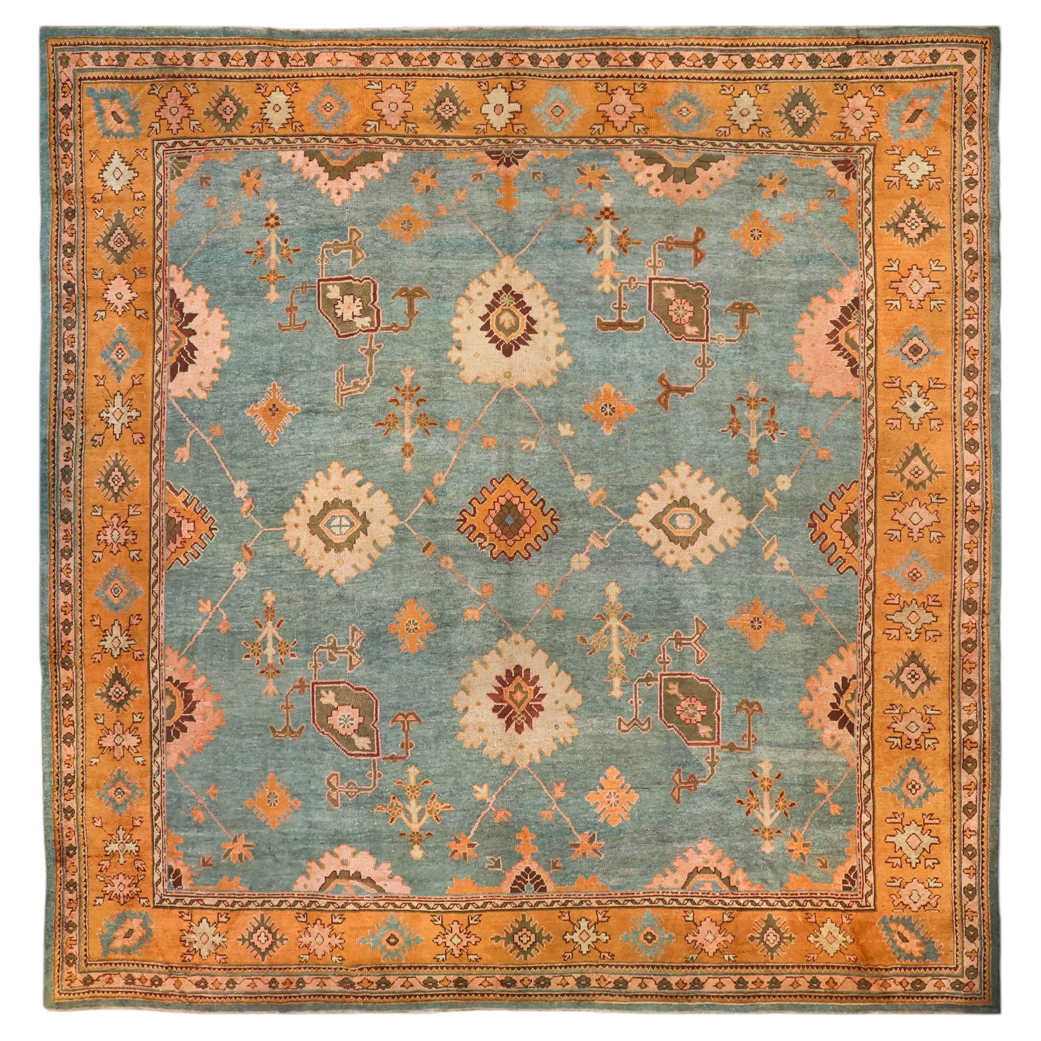 Alriz Collection: Antique Orange & Teal Blue Oushak Rug, 1900