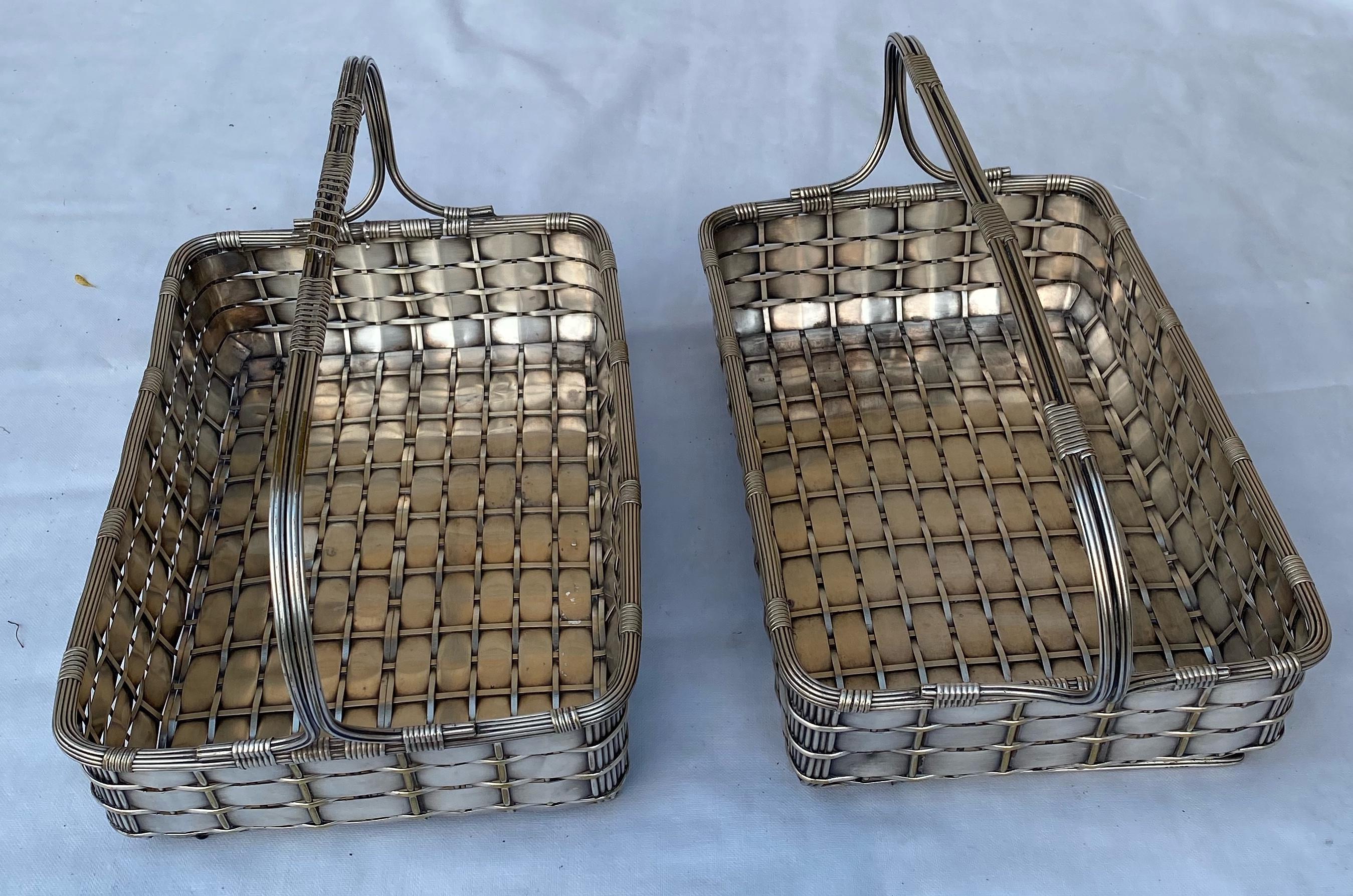 Pair of silver metal baskets in braided metal used for the presentation Goldsmith hallmarks on the back.
Measures: Length: 49cm
Width: 29cm
Height: 27cm
Length excluding handle: 42 cm
Height without handle: 12 cm.