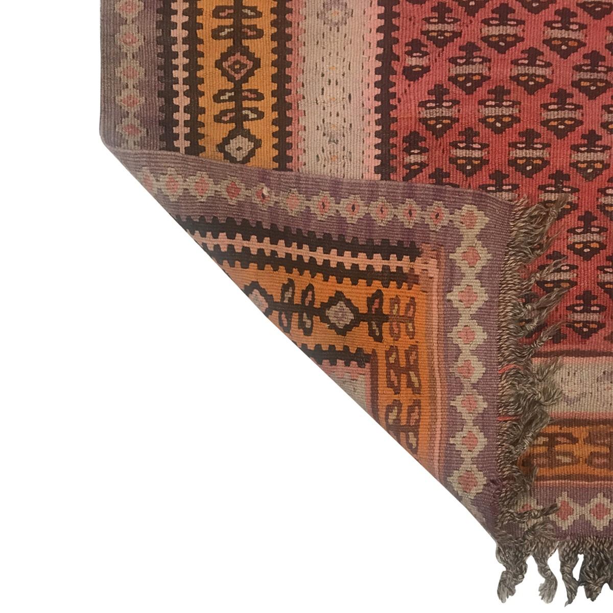 One-of-a kind vintage and antique Ghelims rugs, from Afghanistan, Turkey, Iran, Eastern and Central Asia. These historic rugs, woven between 1890 and 1950, have a contemporary flair for color, alongside their transitional and tribal patterns. Each