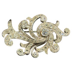 1900 Platinum and Old Mine Cut Diamond brooch with approximately 6c diamonds