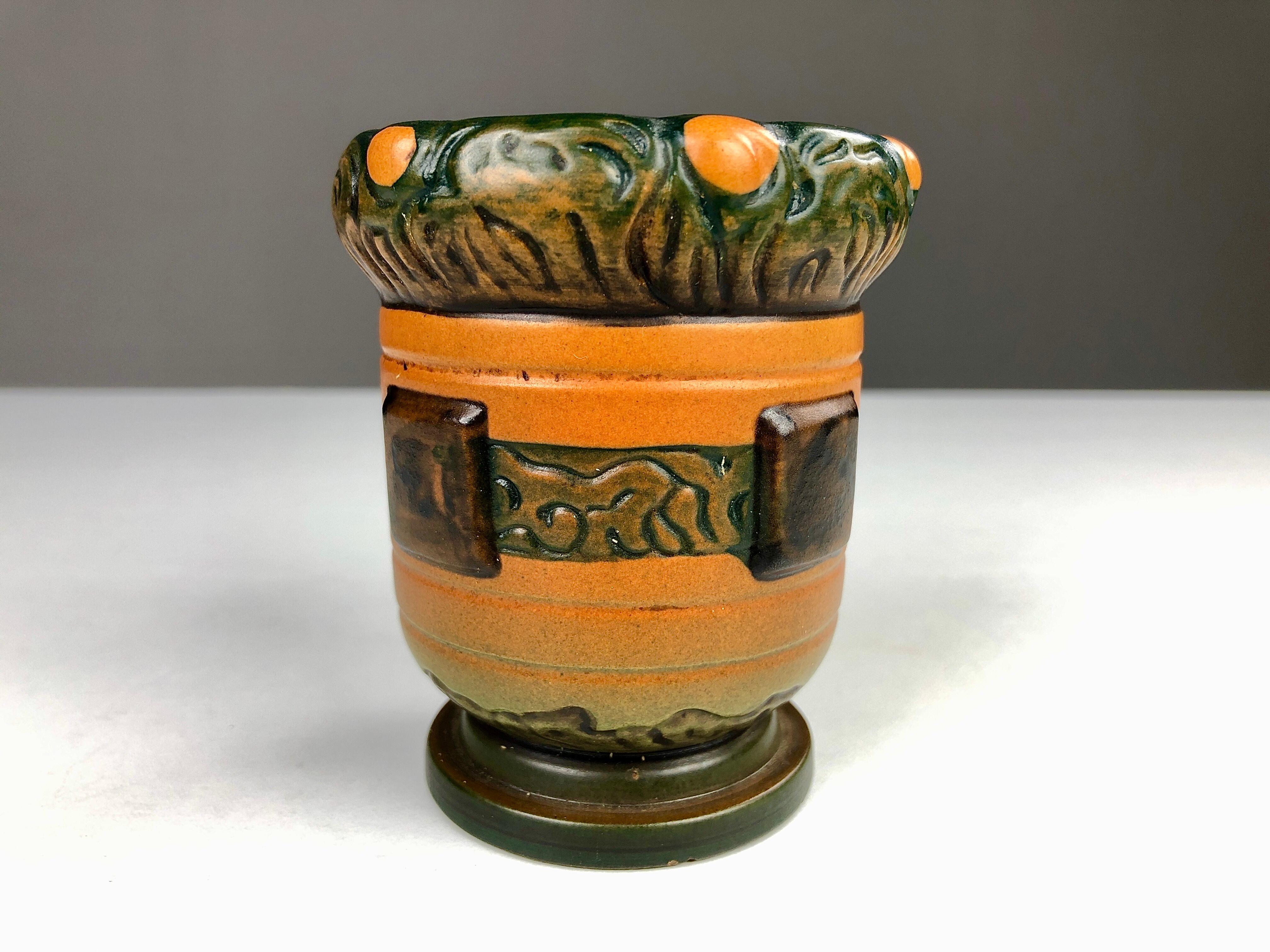 Small Danish Art Nouveau vase by Thorvald Bindesboell for P. Ipsens Enke designed in 1905

The vase is in good vintage condition

Thorvald Bindesbøll (1846-1908) is was Denmark's leading ornamental artist of his time. His pronounced independence and